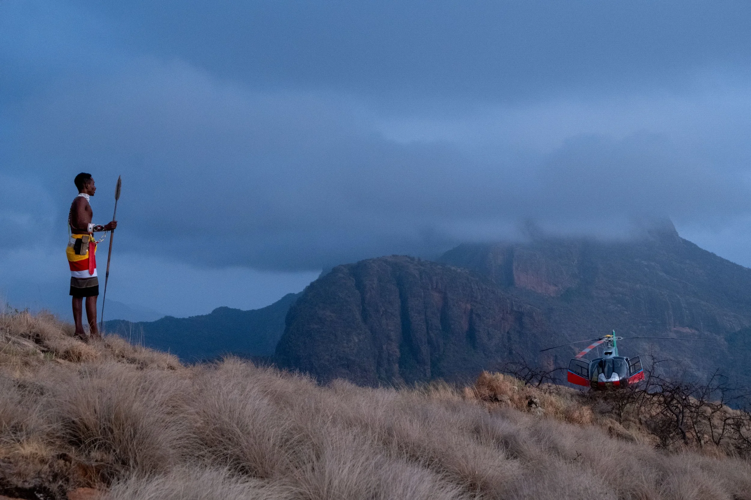 Breakfast with Mt. Poi and a colorful samburu warrior and helipoter that took us to take off - Northern Kenya