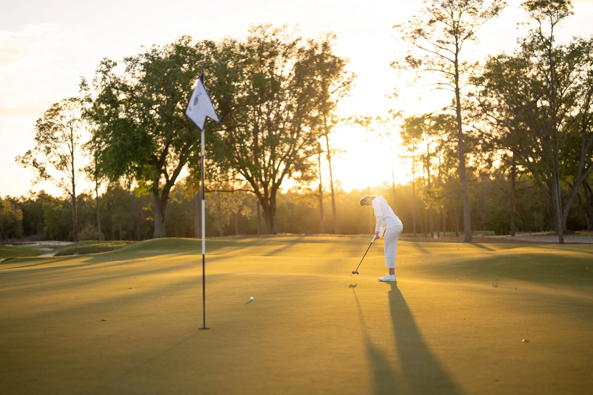 Golf green at sunrise