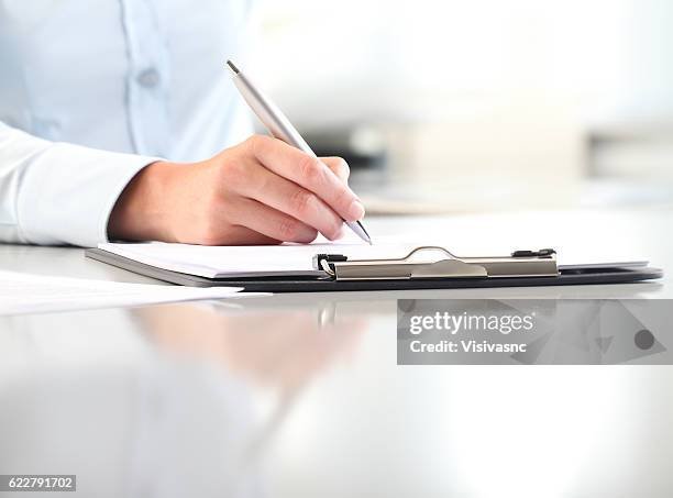 Medicare paperwork being reviewed and completed during the enrollment process.