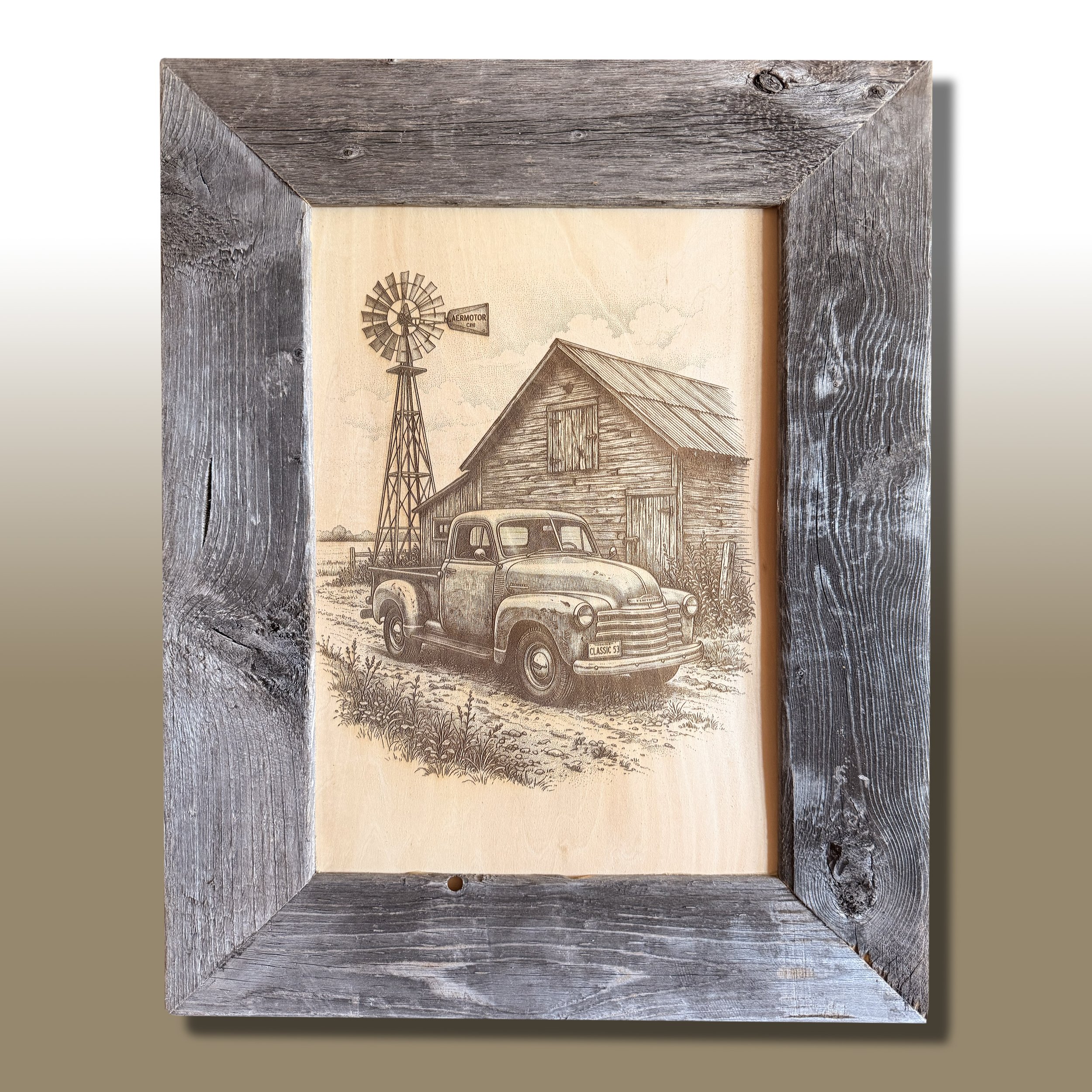 Close-up of a rustic wooden picture frame around a sepia-toned drawing of a barn, truck, windmill, and an American flag.