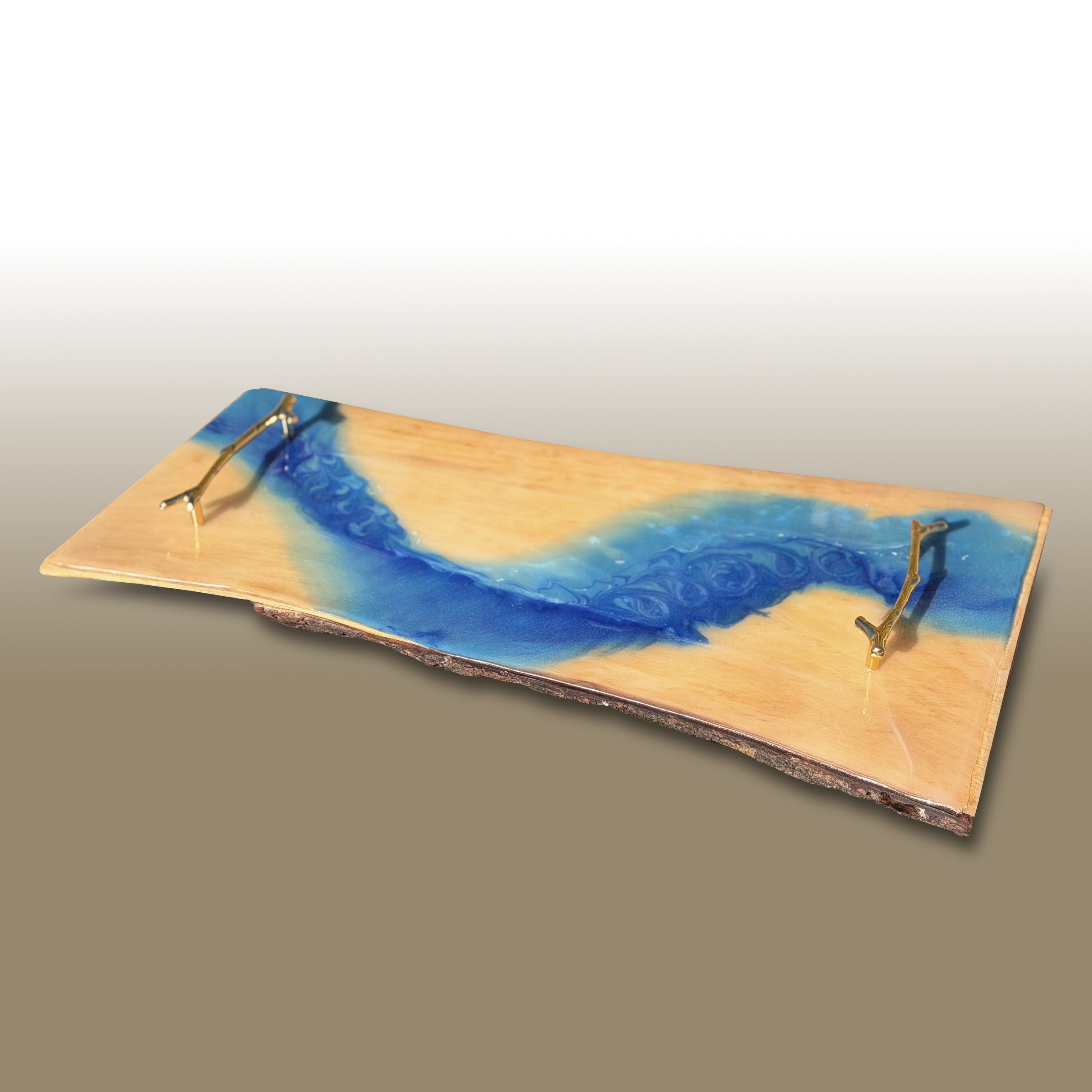 Close-up of a floating wine glass within a resin art piece on a wooden base, featuring swirls of blue and gold colors.