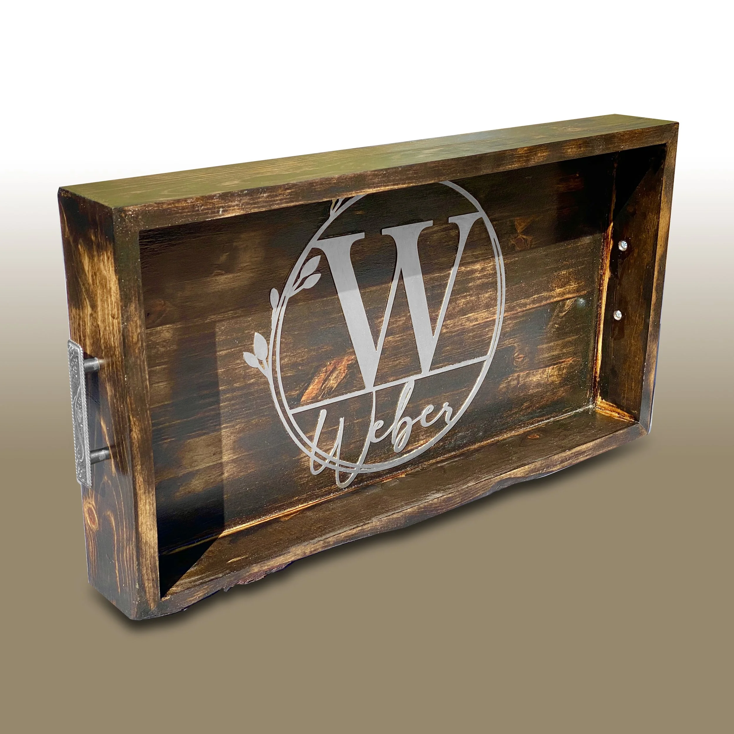 Wooden sign with a white circular logo and text that reads 'Gather' against a neutral background.
