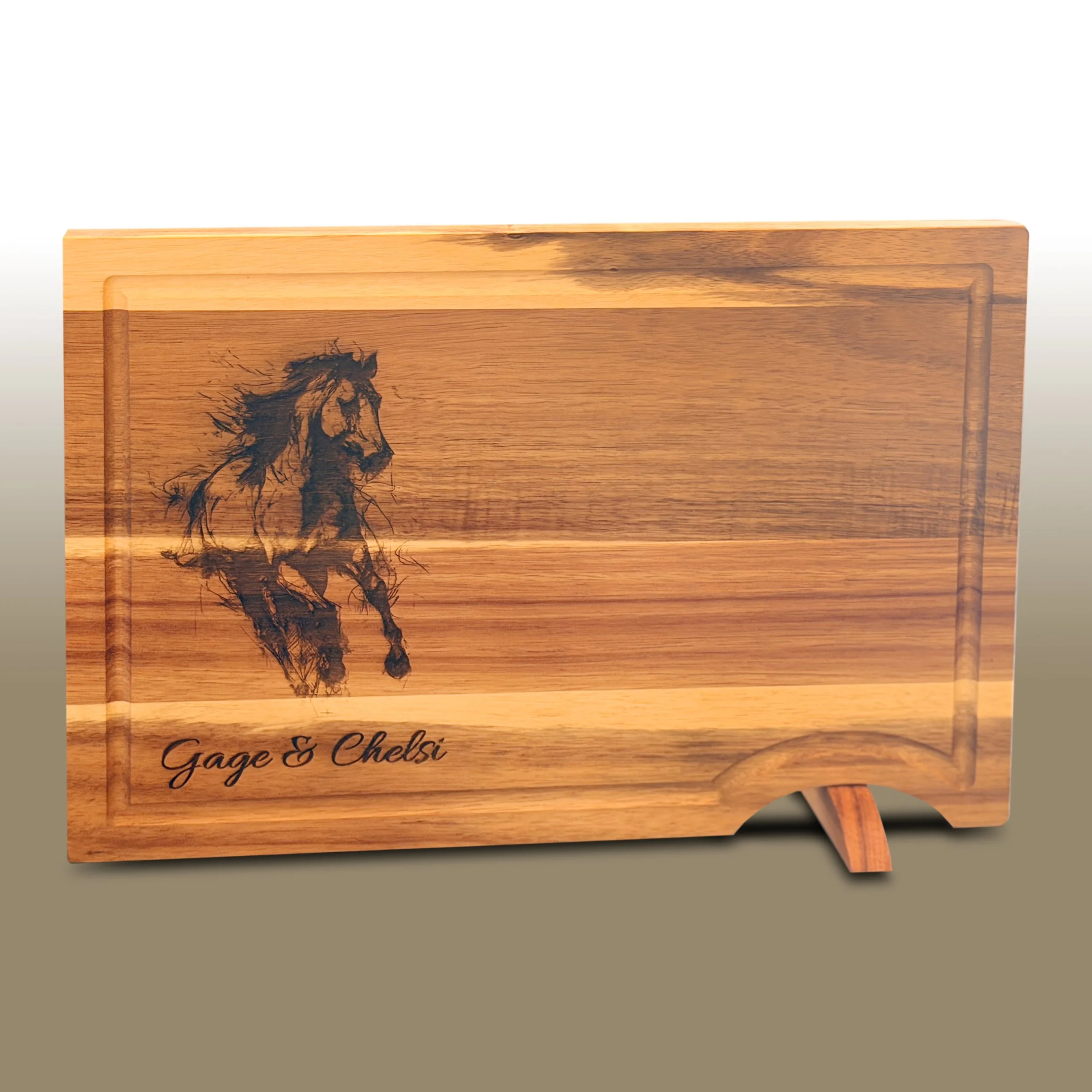 Cutting board with engraved horse illustration with custom engraving