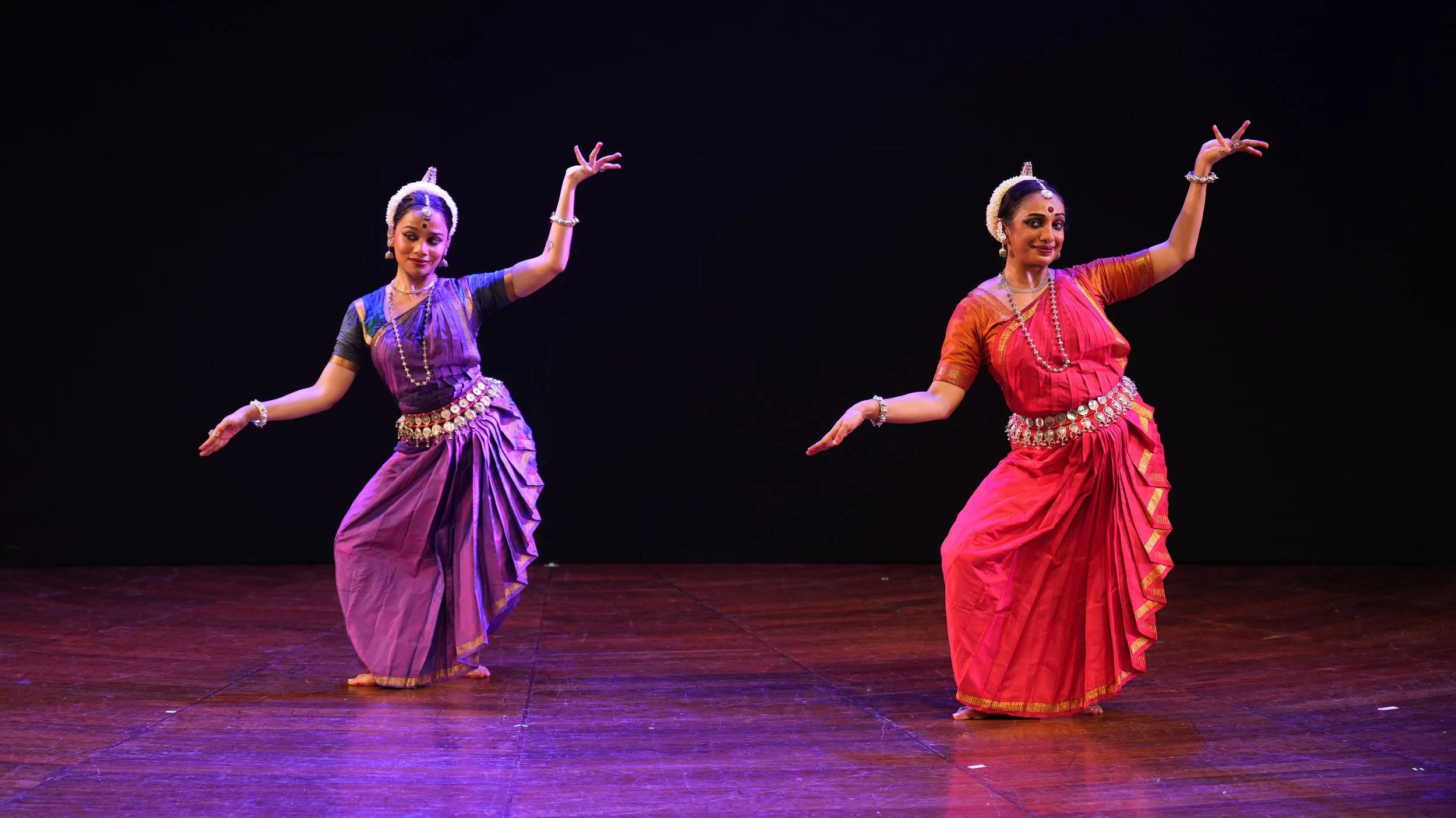 two dancers performing on stage