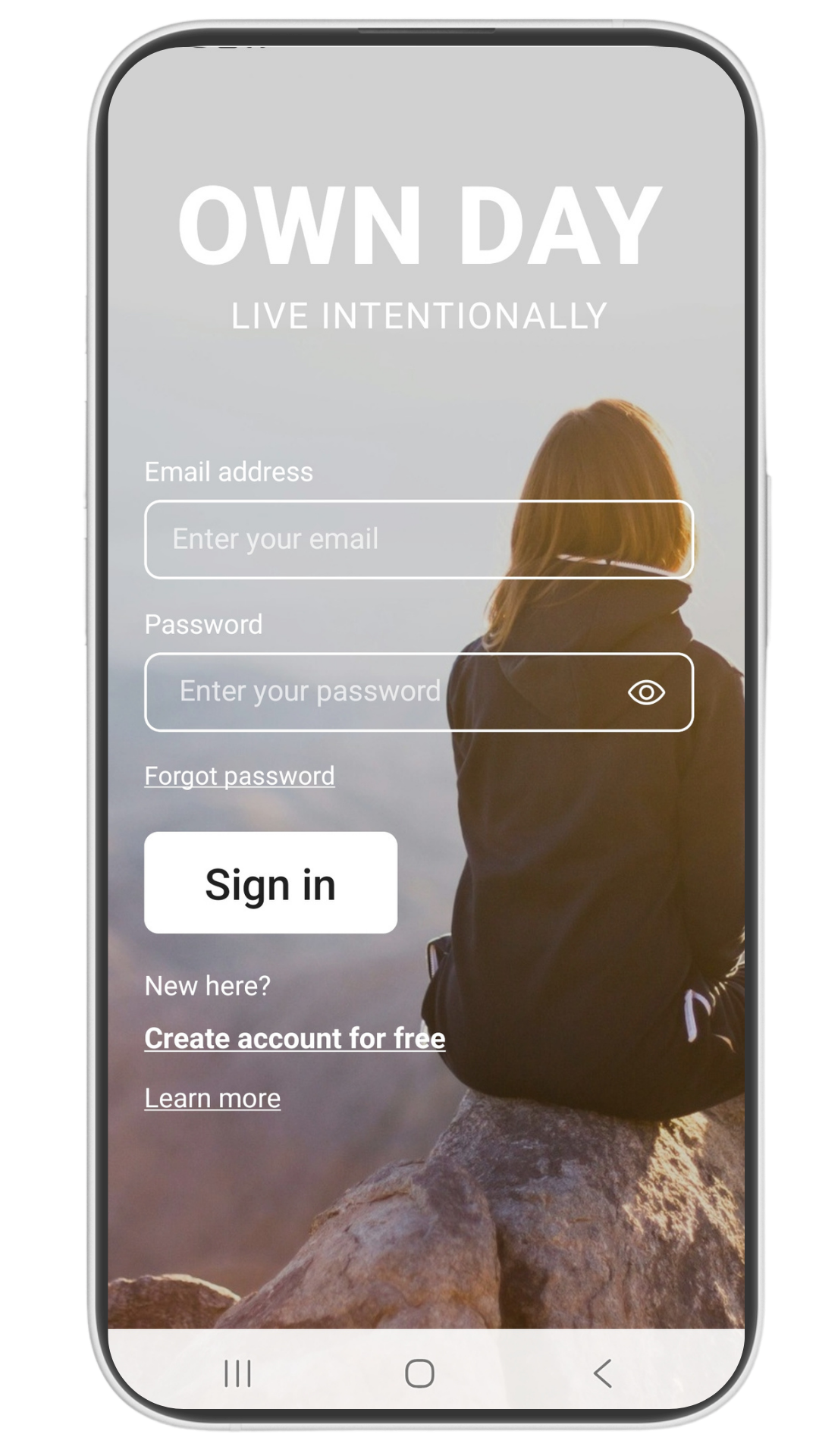 Mobile phone screen displaying a sign-in page with the background of a person sitting on a rock, overlooking a landscape at sunrise or sunset. The page header reads "OWN DAY LIVE INTENTIONALLY," with fields for email and password, and options to create an account or learn more.