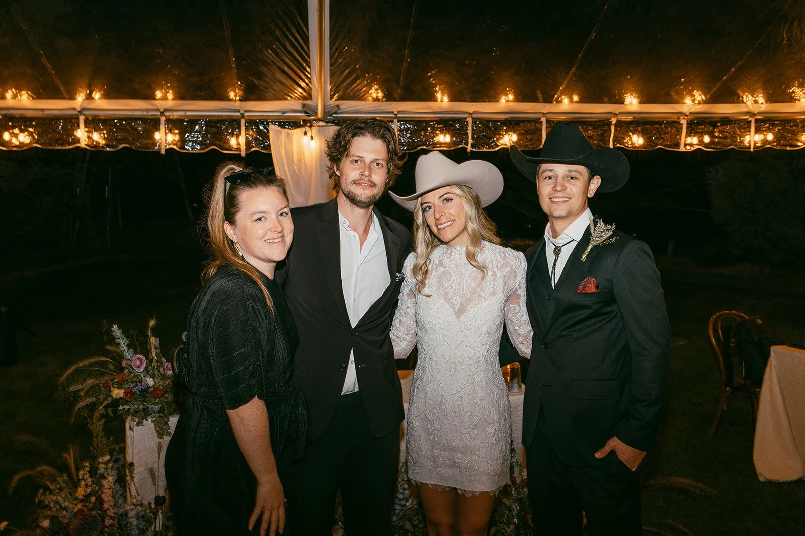 KLassey Frames wedding filmmakers with a bride at a wedding reception — camcorder rental for weddings