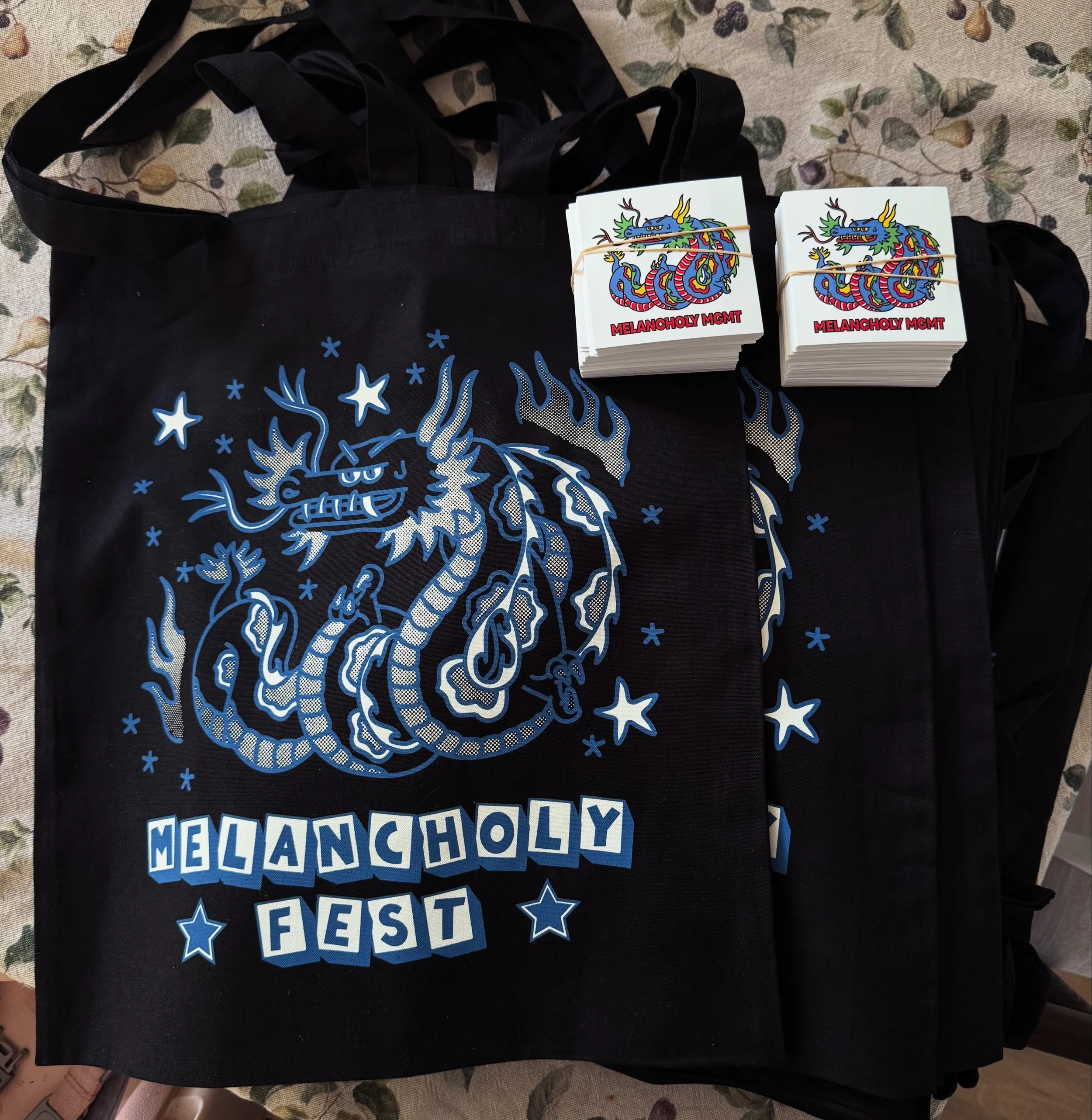 Totes &amp; stickers ready for Melancholy Fest on the 6th September! Printed by the boss @vinosangre. Designed by @h69ts. Cornish Cru! Tickets still available in our bio. See ya there. X