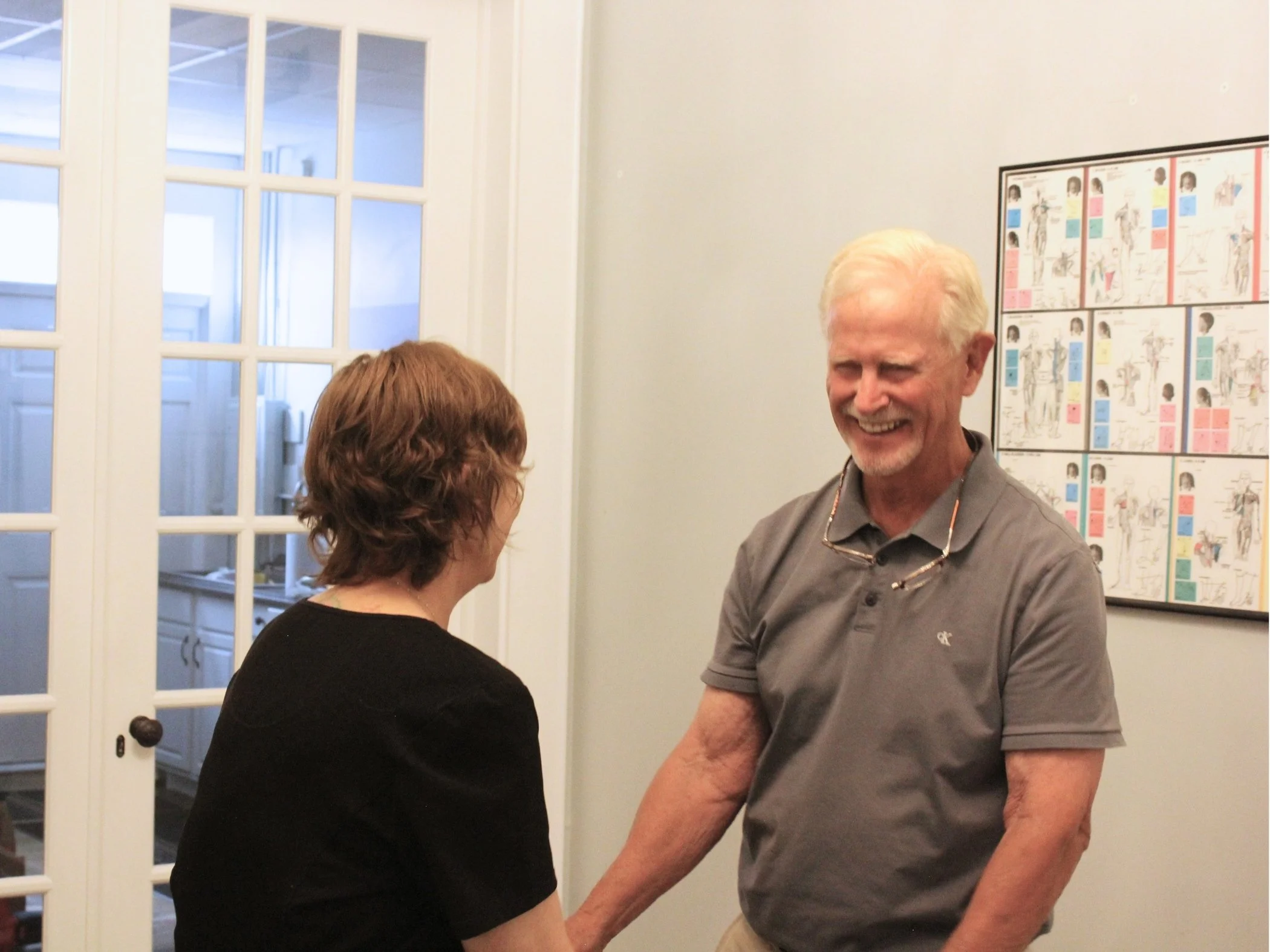 Dr. Baker discussing functional wellness and supplements with patient