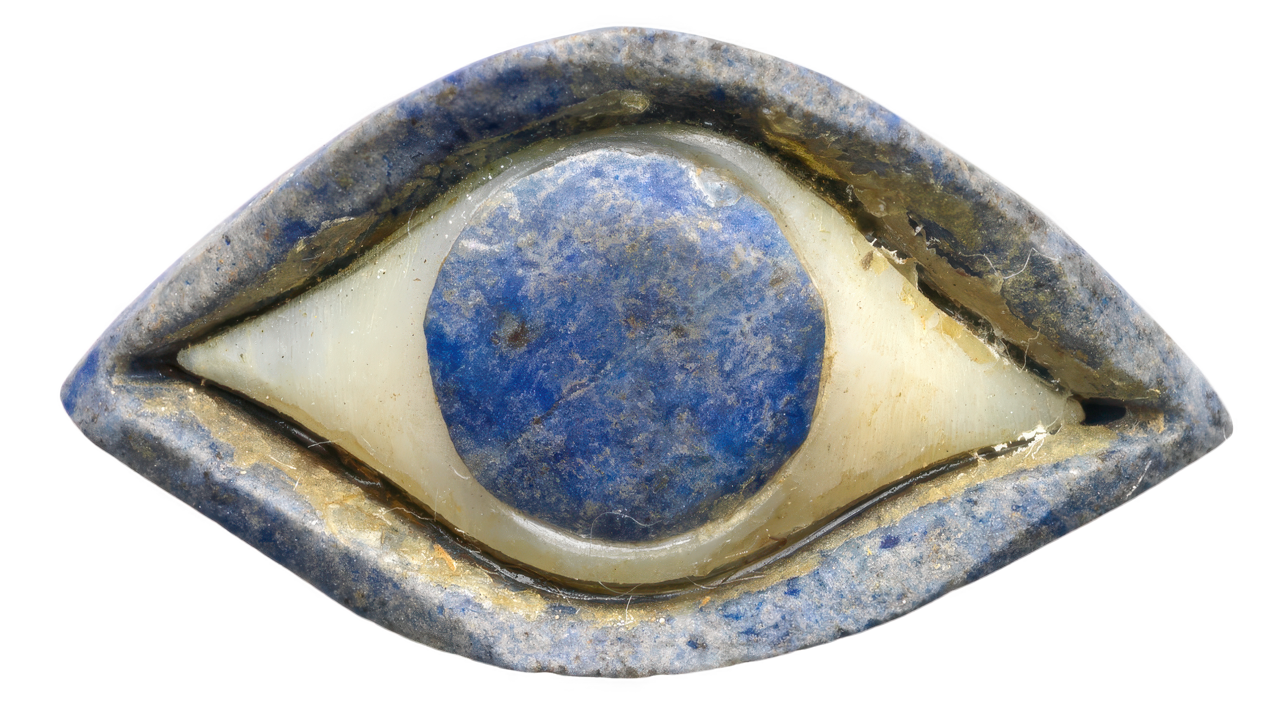 Close-up of an ancient blue and white ceramic eye-shaped artifact.