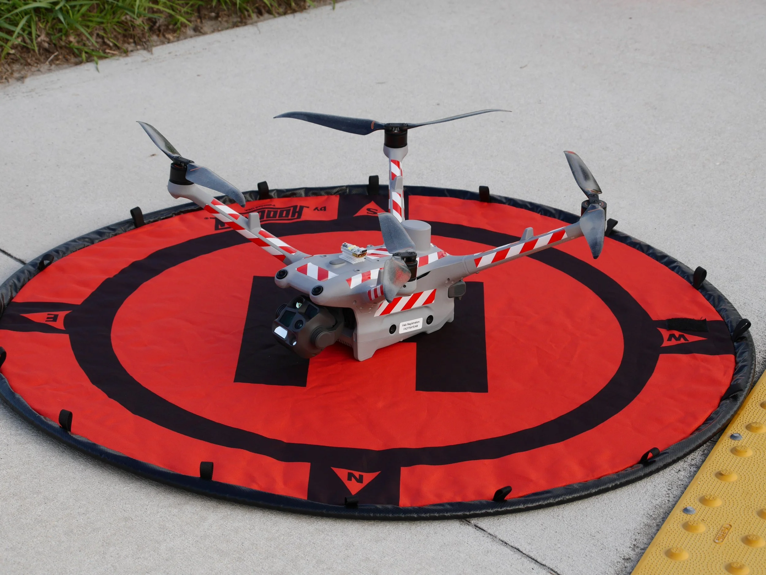 DJI Matrice 4TD enterprise drone on helipad launch pad ready for aerial mapping and inspection flight in Tampa Bay Florida.