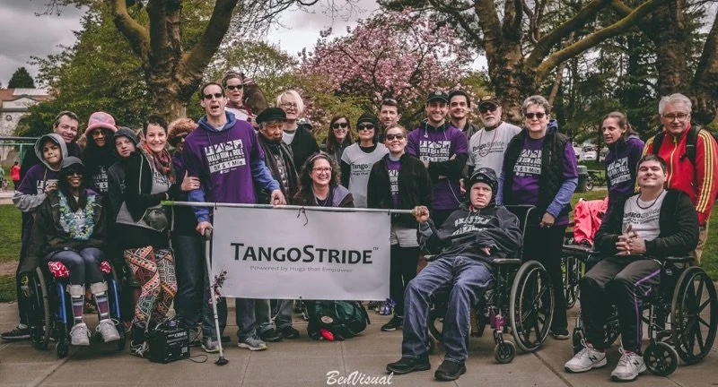 TangoStride students pose for a picture after a parade.
