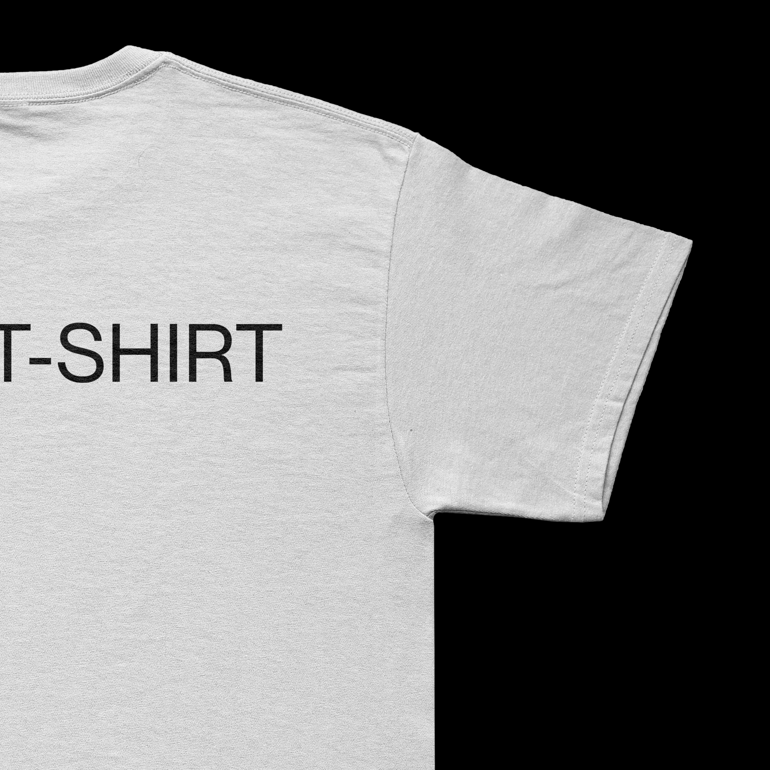 Close-up of a white T-shirt against a black background, showing the shoulder seam and part of the printed text.