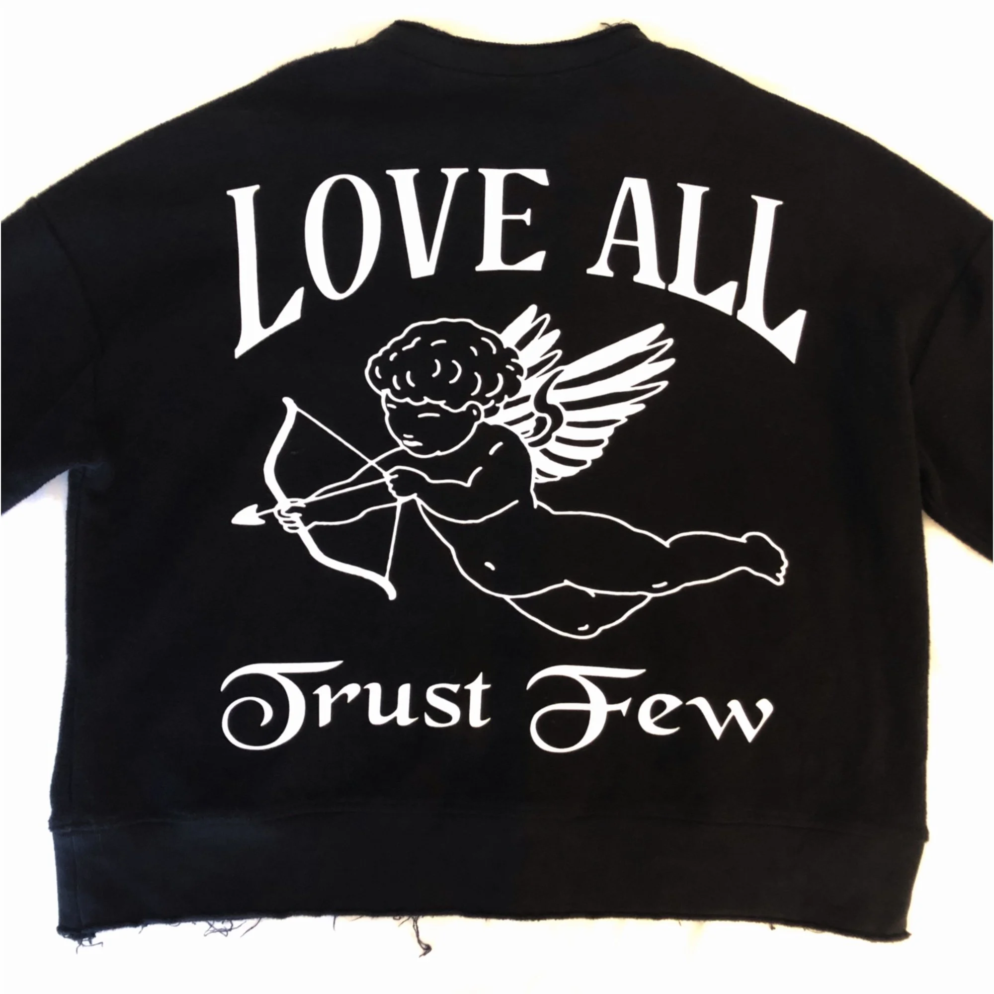 Black t-shirt with white text and graphic design, featuring a winged angel holding a bow and arrow, with the words 'Trust Few' printed below.