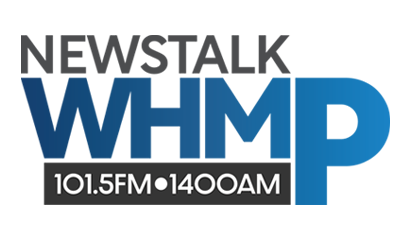 Radio station logo for WTXF, 101.5 FM, 1400 AM, with a blue gradient background and station branding.