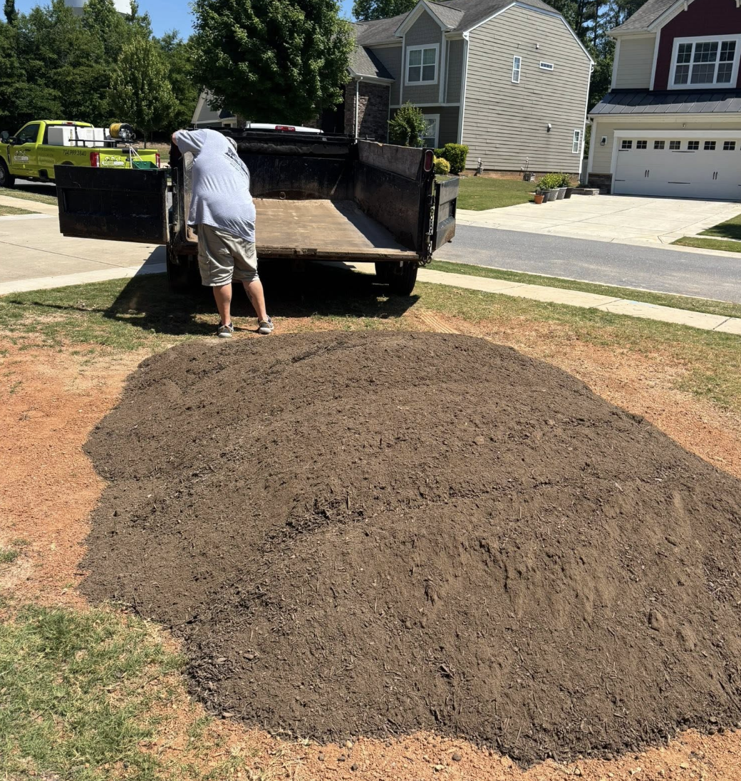 Drainage improvements completed in Pineville, NC to redirect water away from the property.