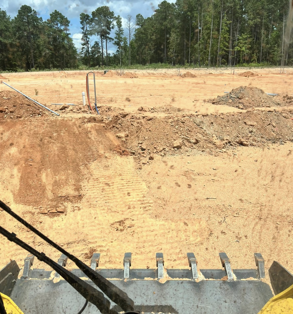 Land clearing and grading services completed in Clover, SC using professional equipment.