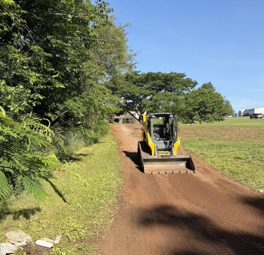 Palmetto South Construction grading and preparing a driveway or property access road in York County, South Carolina.