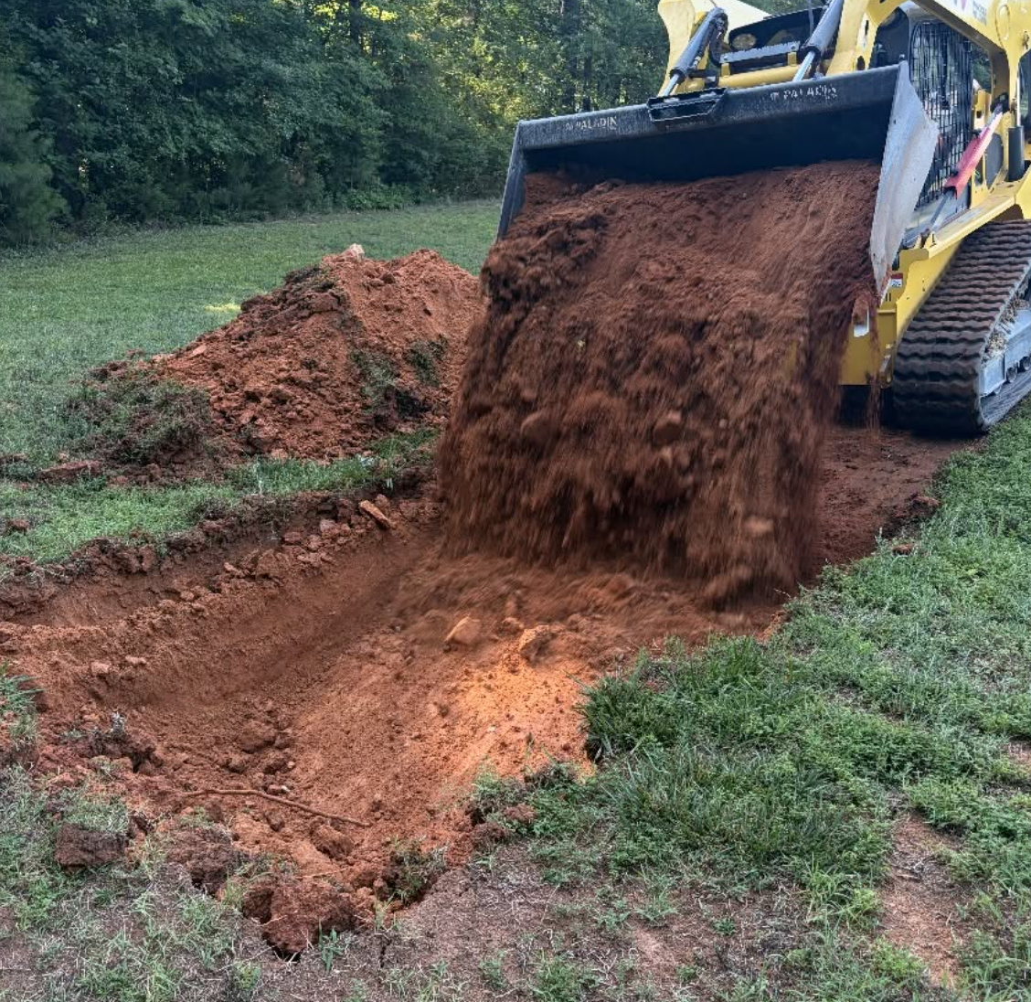Retaining wall installation completed in Mooresville, NC for improved drainage and structural support.