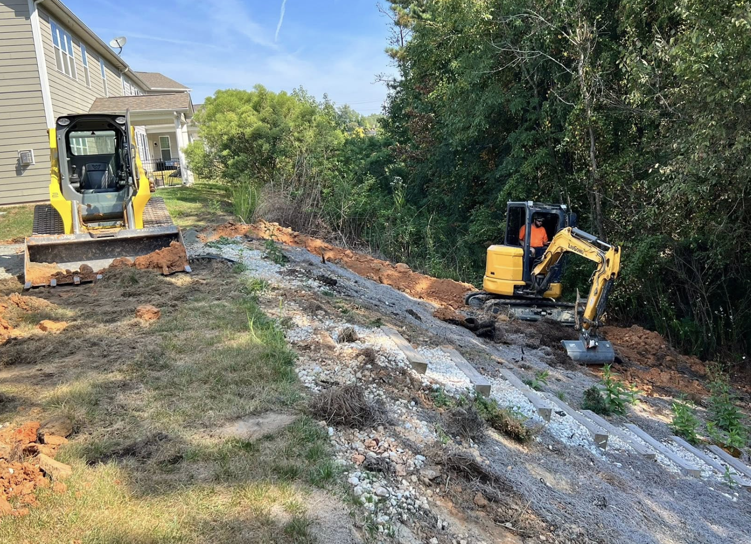 Professional grading and leveling completed in Huntersville, NC with precision earthmoving.