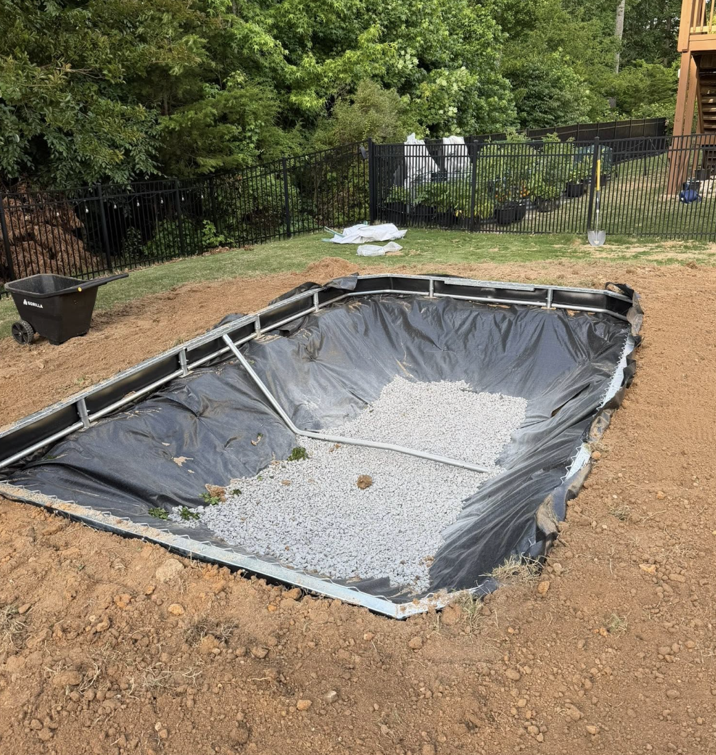 Retaining wall construction completed in Charlotte, NC to improve stability and usable outdoor space.
