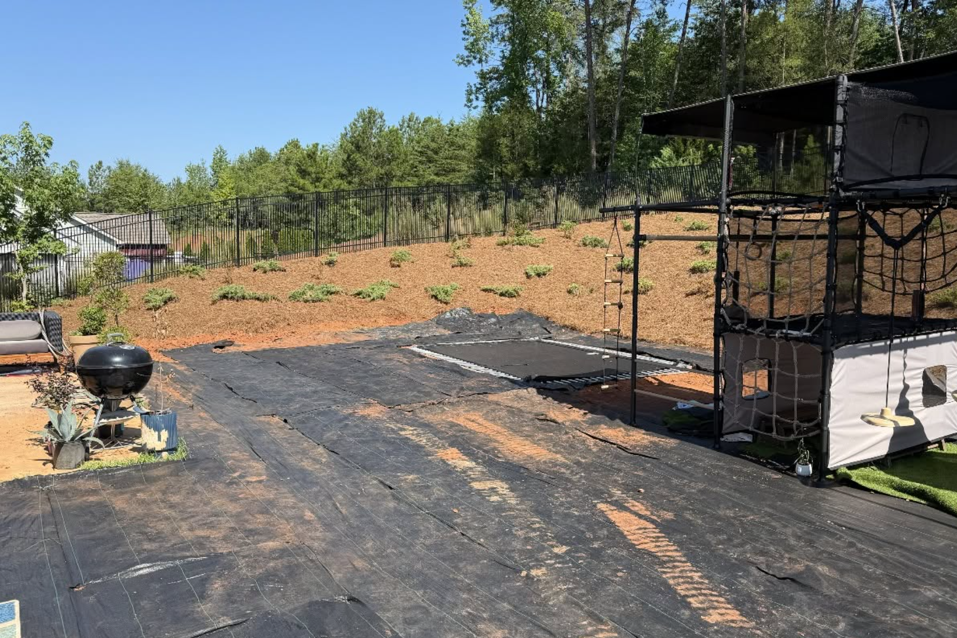 Prepared backyard site for an in-ground trampoline installation by Palmetto South Construction in Lancaster, SC