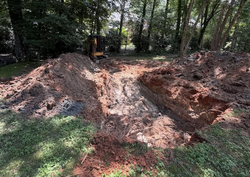 Excavation work during a professional sinkhole remediation project completed by Palmetto South Construction in the Charlotte region.