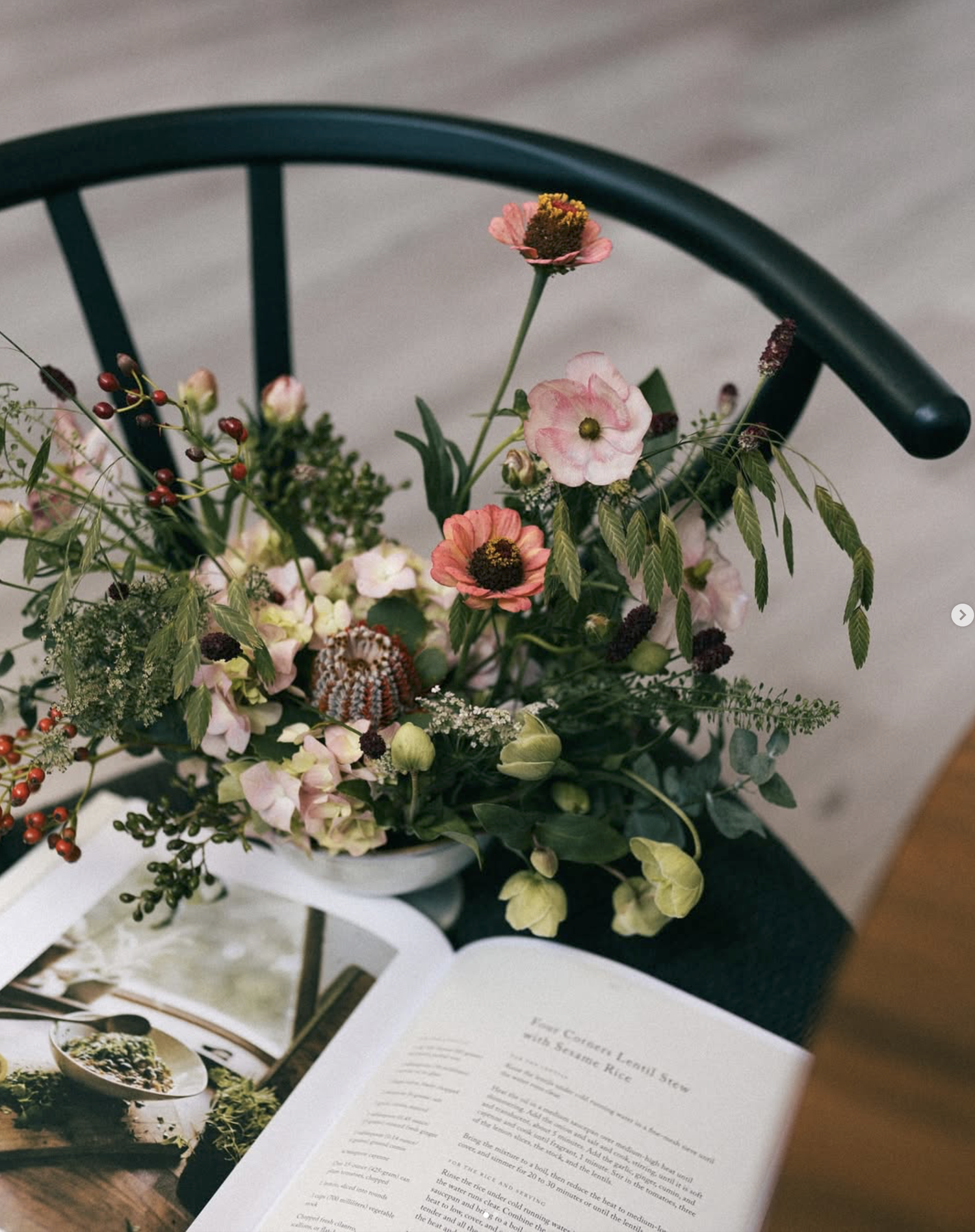 Lush floral arrangement resting on a chair
