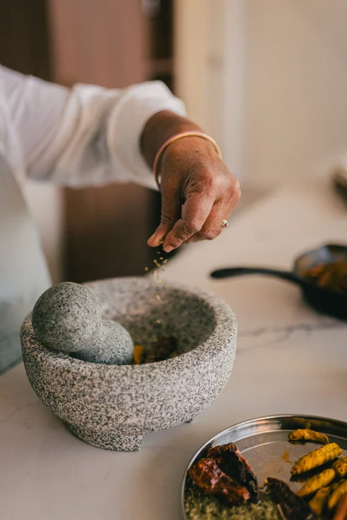 Mortar and pestle worn smooth from years of grinding spice
