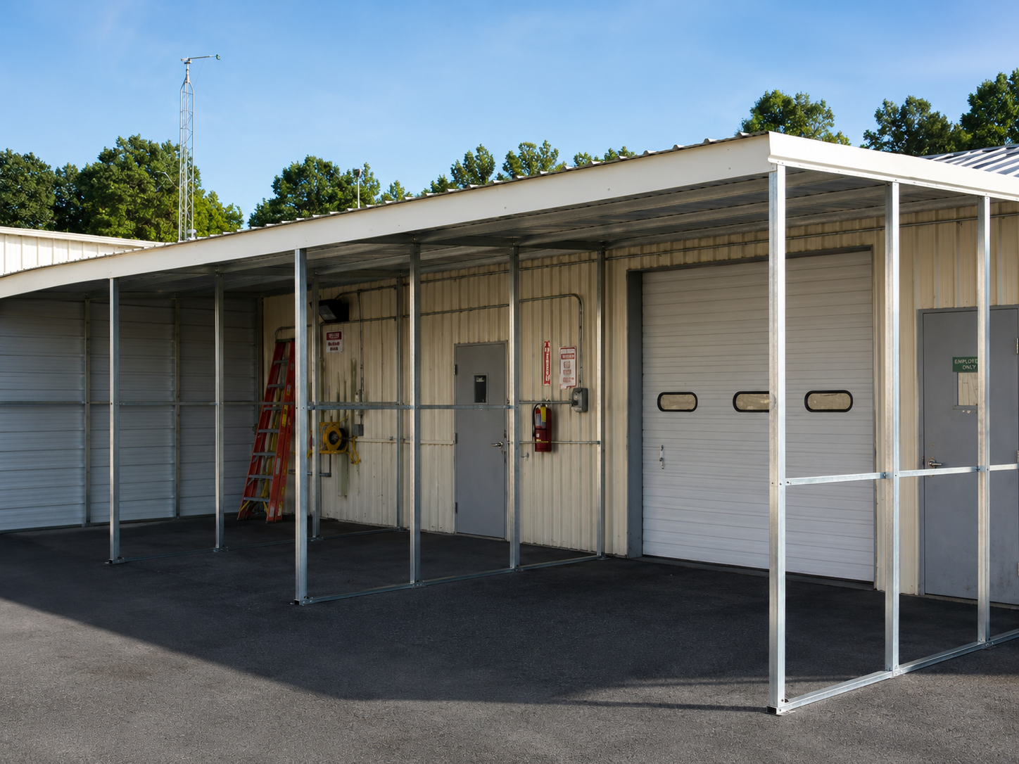 Commercial aluminum awning covering a loading and service area