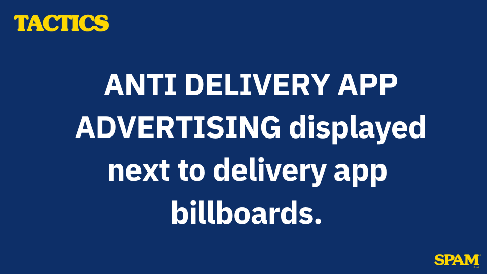 A sign with the text "TACTICS" in yellow at the top left corner, large white text in the center reading "ANTI DELIVERY APP ADVERTISING displayed next to delivery app billboards," and the word "SPAM" in yellow at the bottom right corner.