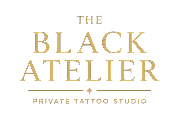 Graphic logo for The Black Atelier Private Tattoo Studio with stylized gold and red text on a black background.