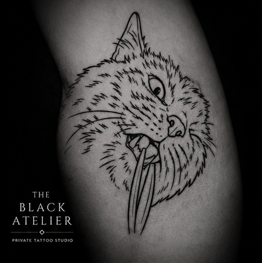 Tattoo of a lynx with its mouth open and tongue out, in black and gray ink.