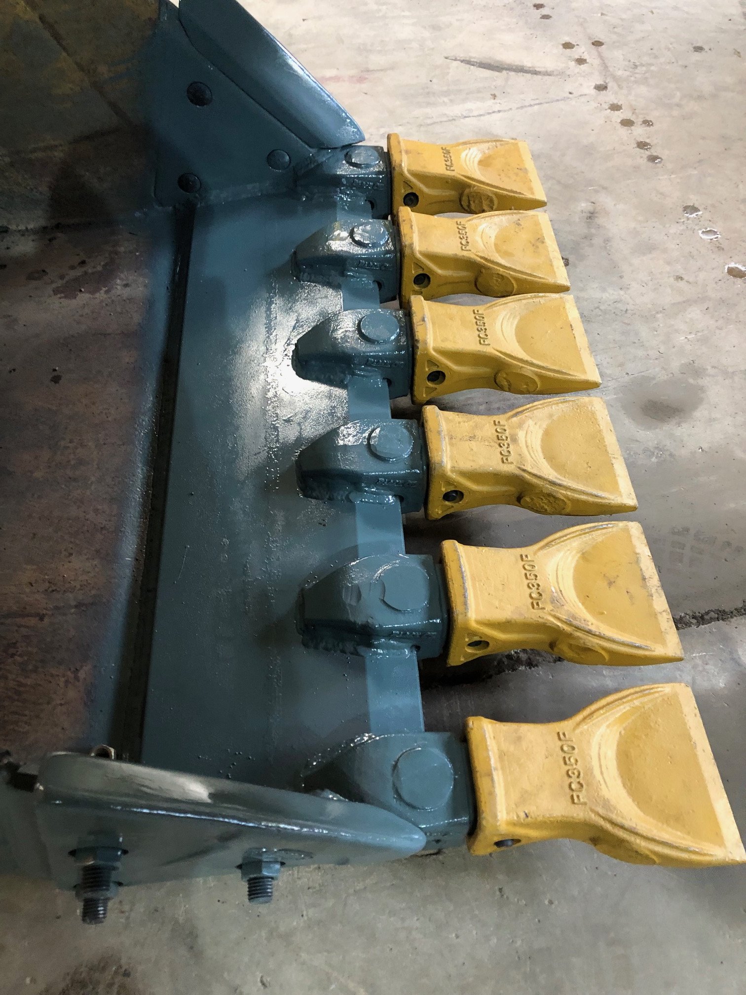 Completed heavy equipment repair, replacement cutting edge and adapters.