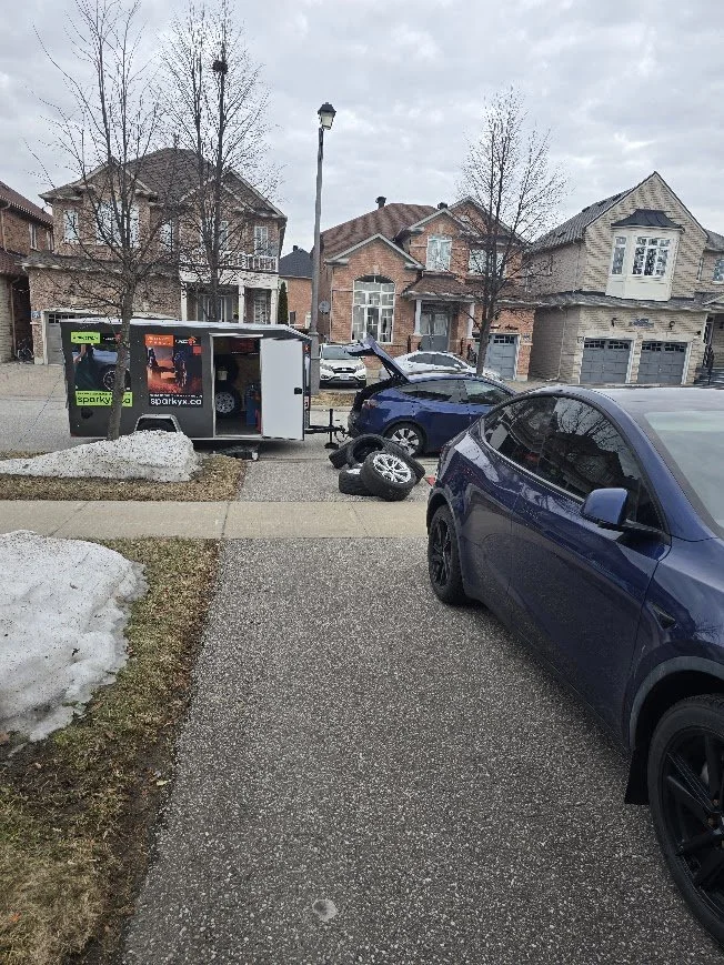 EV mobile tire changeover at home - replacing tires on existing rims for a customer in his driveway.