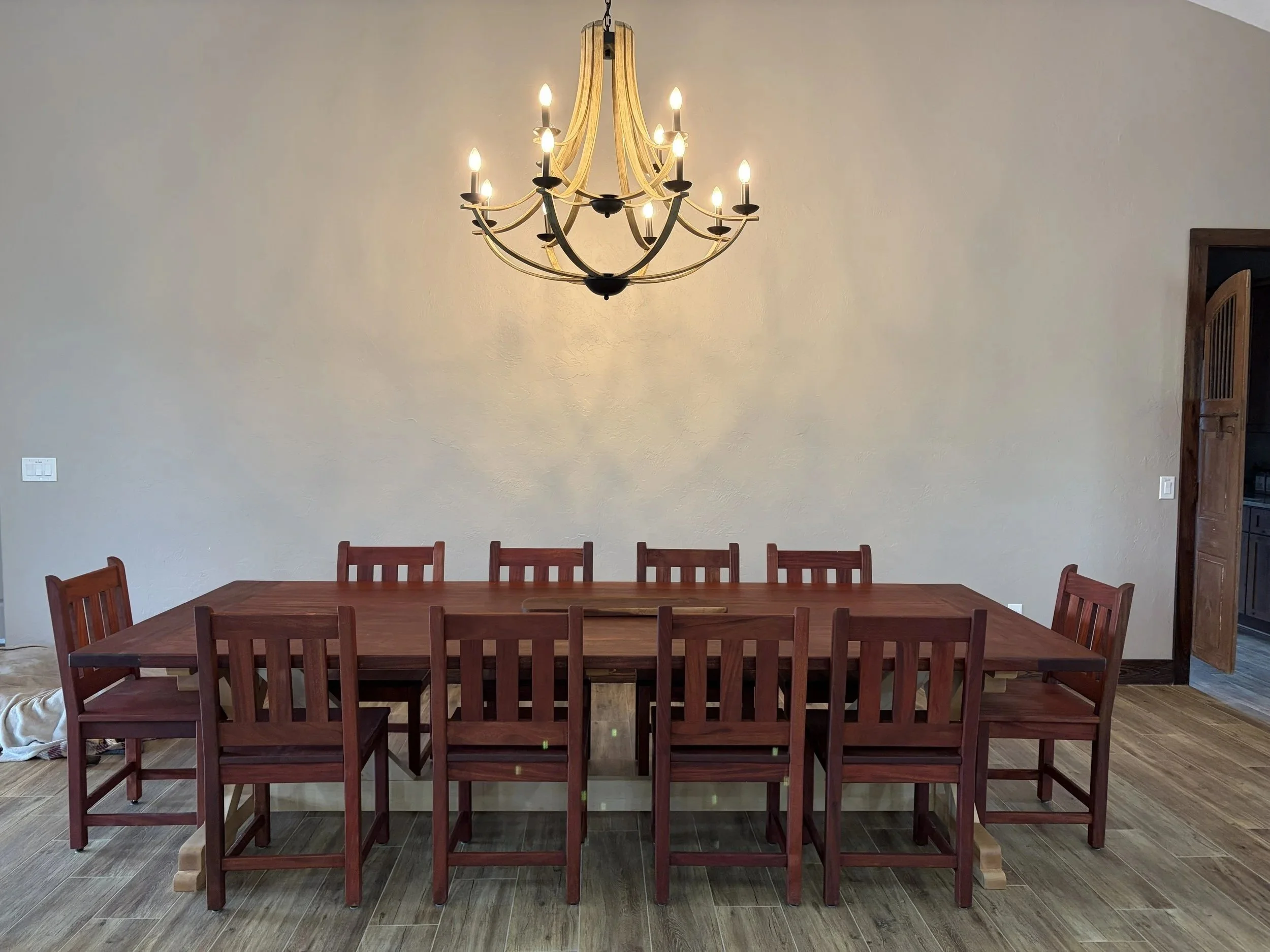 10-Foot Mahogany & Maple Dining Table with Matching Chairs
A full custom dining set built to host twelve — solid mahogany table paired with a hand-finished maple trestle base, matching mission-style chairs, and a Rubio Monocoat Pure finish that lets 