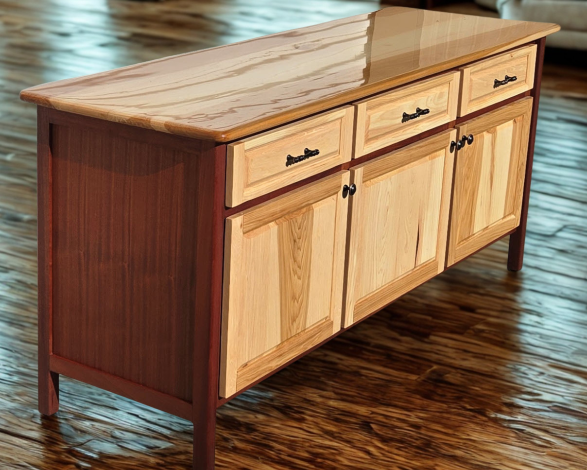 A wooden sideboard with three drawers and three cabinets, featuring black handles, standing on four legs on a hardwood floor.