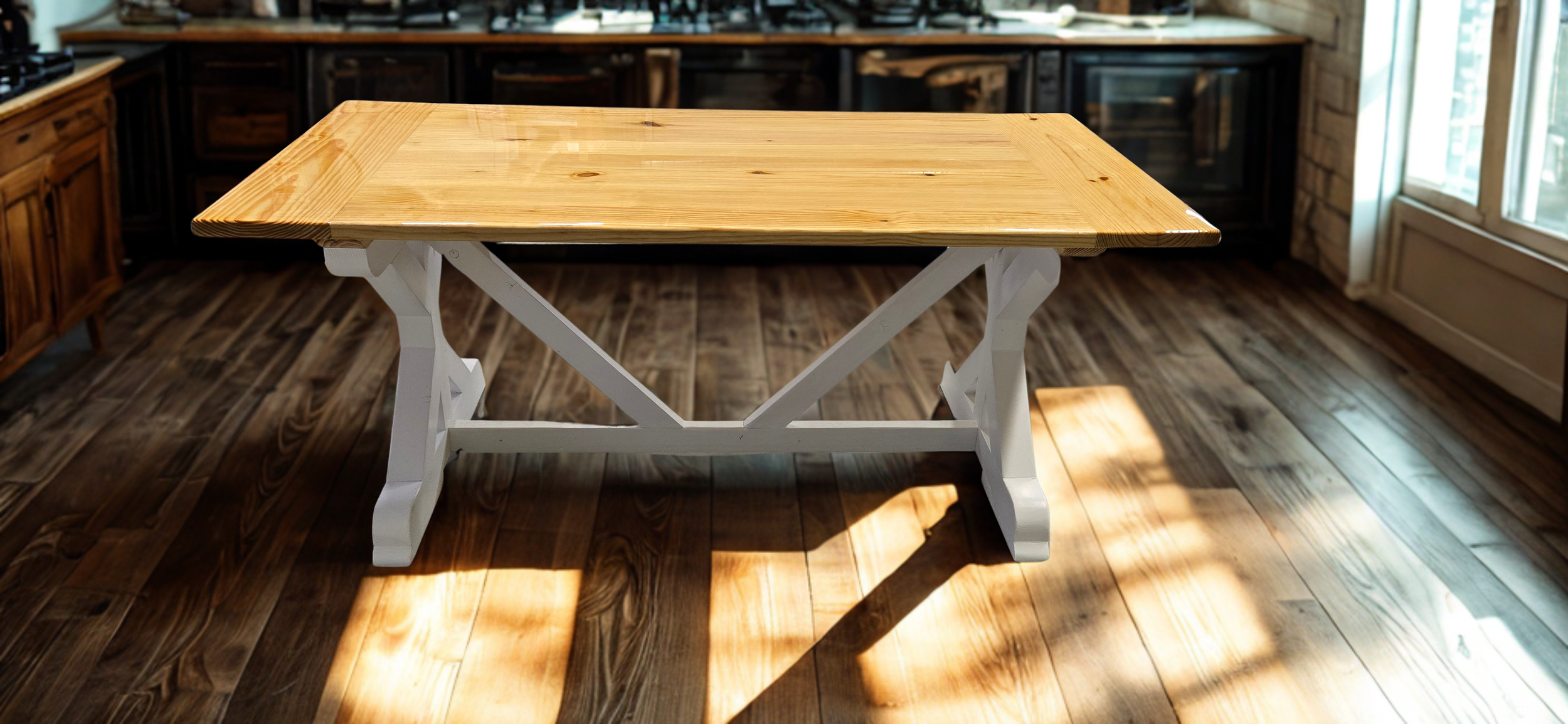 A wooden table with a white base in a cozy kitchen with wooden flooring, brick walls, and natural sunlight streaming in.