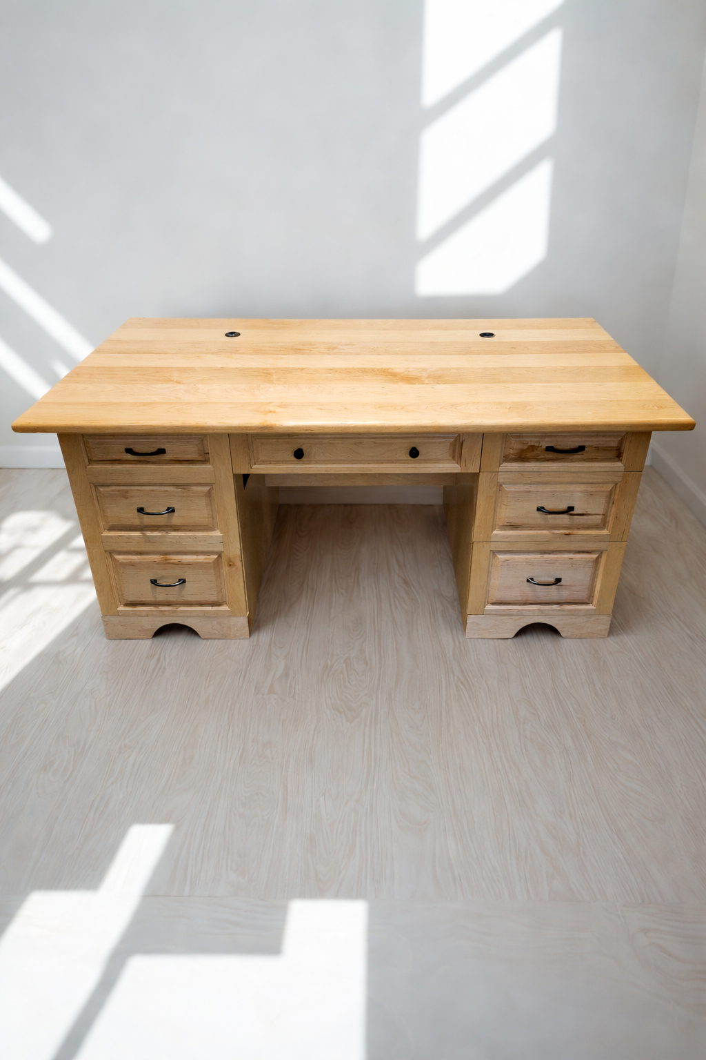 Handcrafted hard maple executive desk with multiple drawers, built by Poppy's Custom Woodwork in Summerfield, Florida. Custom furniture made to order.