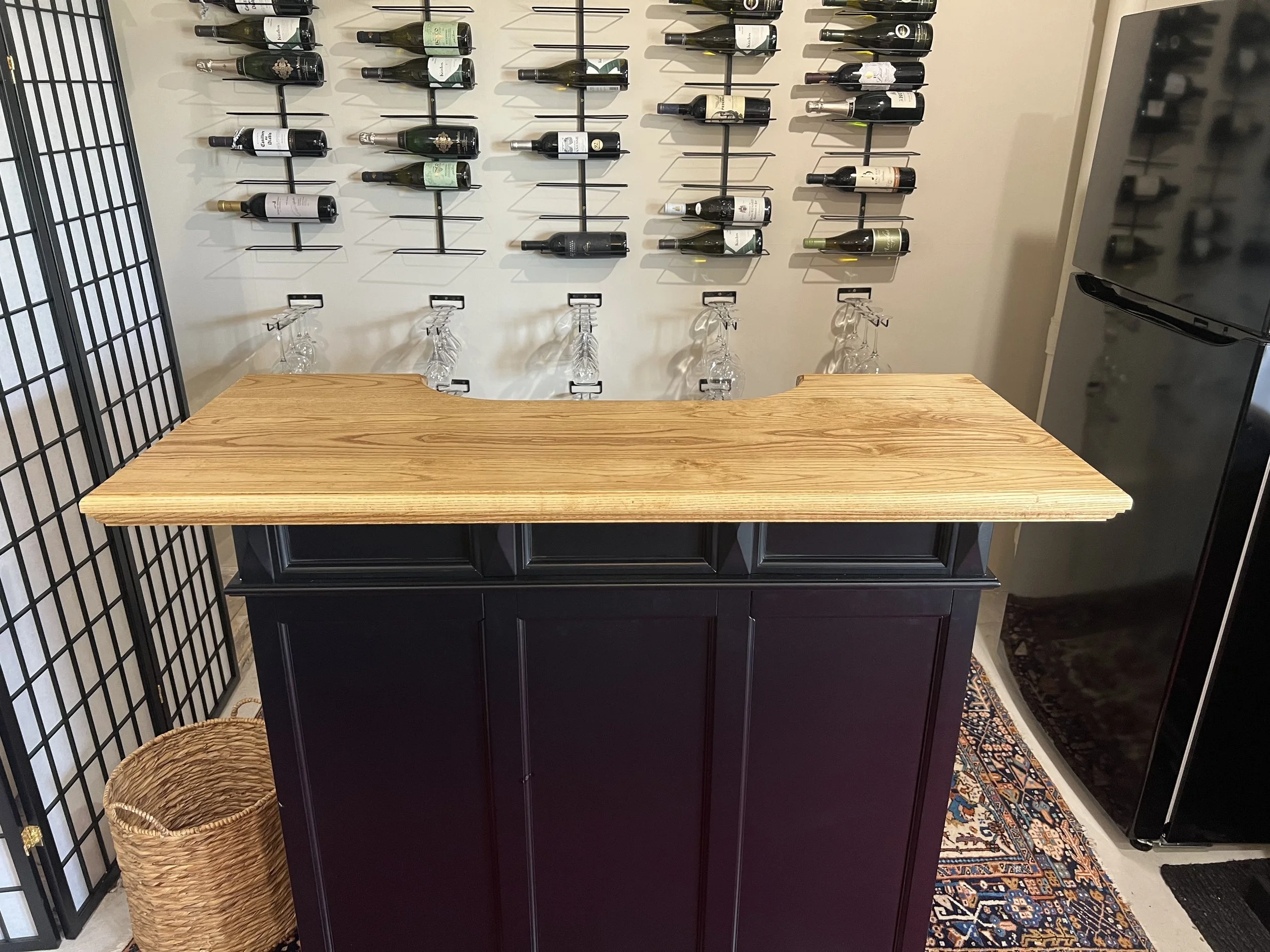 Custom bar with ash countertop