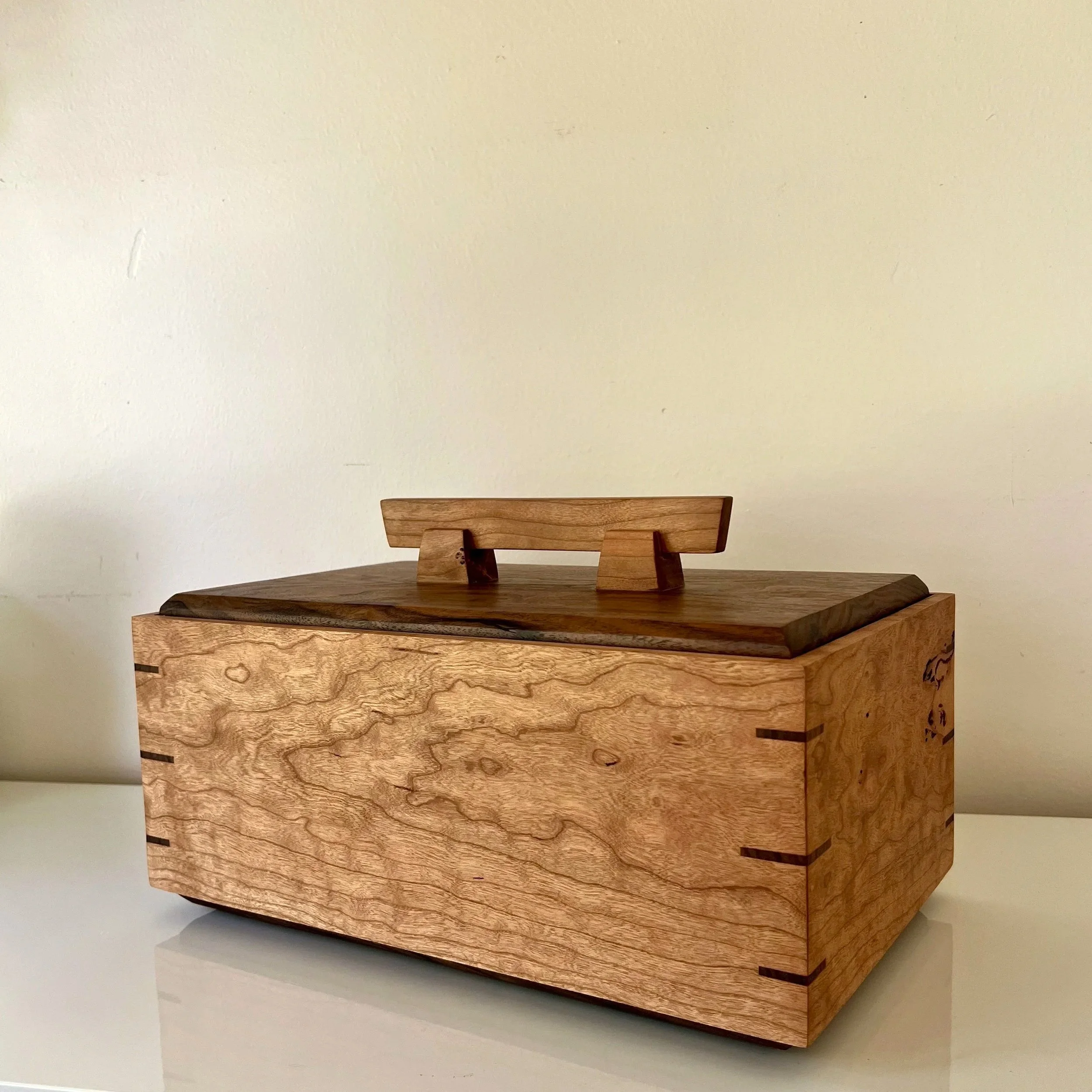 A Japanese inspired jewelry box made from Cherry and Walnut.
