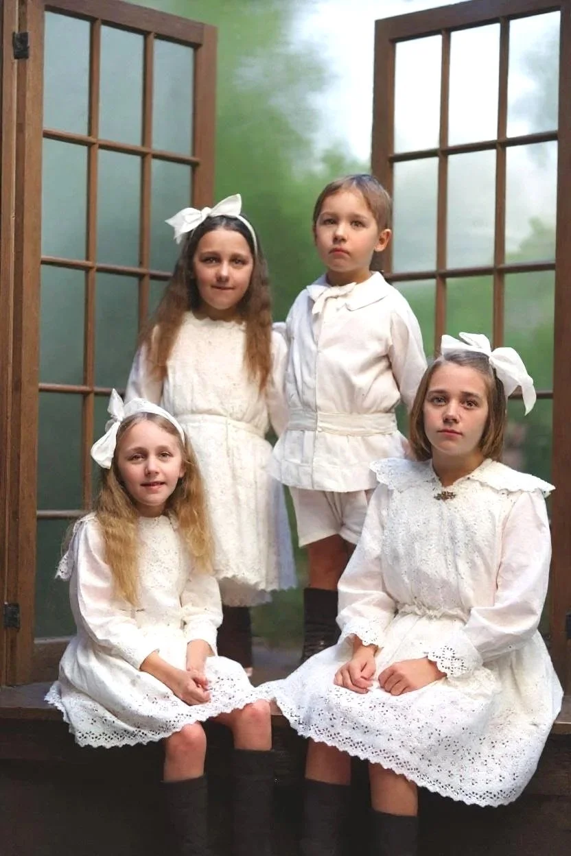 3 girls and a boy early 1900's
