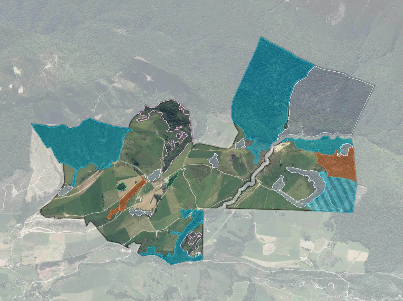 Map of a large wilderness area with multiple regions outlined and color-coded, including lakes and roads visible at the bottom.