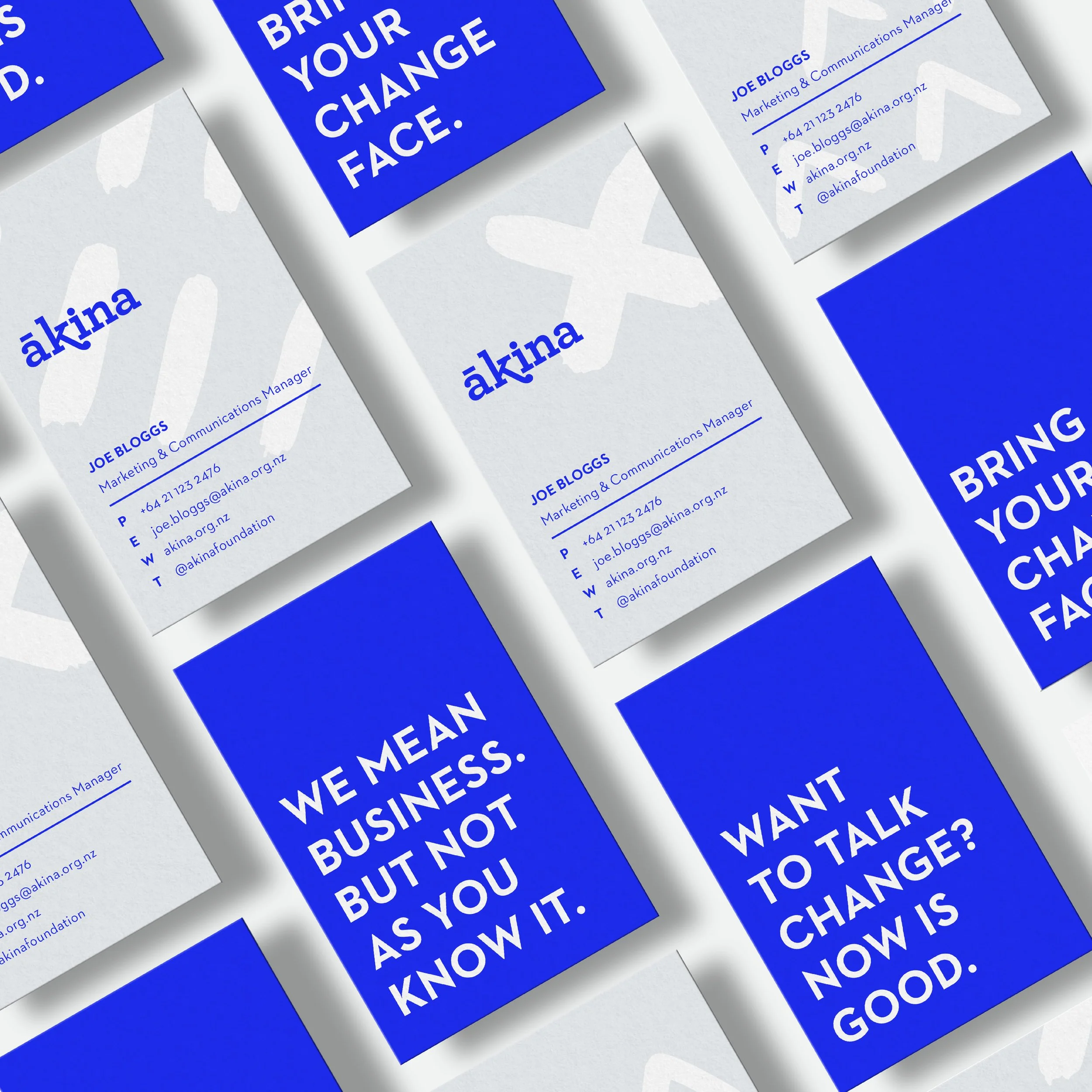 Ākina business cards. Bright blue, grey and white colour scheme. Branding, stationery design, typography, designer, Creative Director. Alice Lloyd.