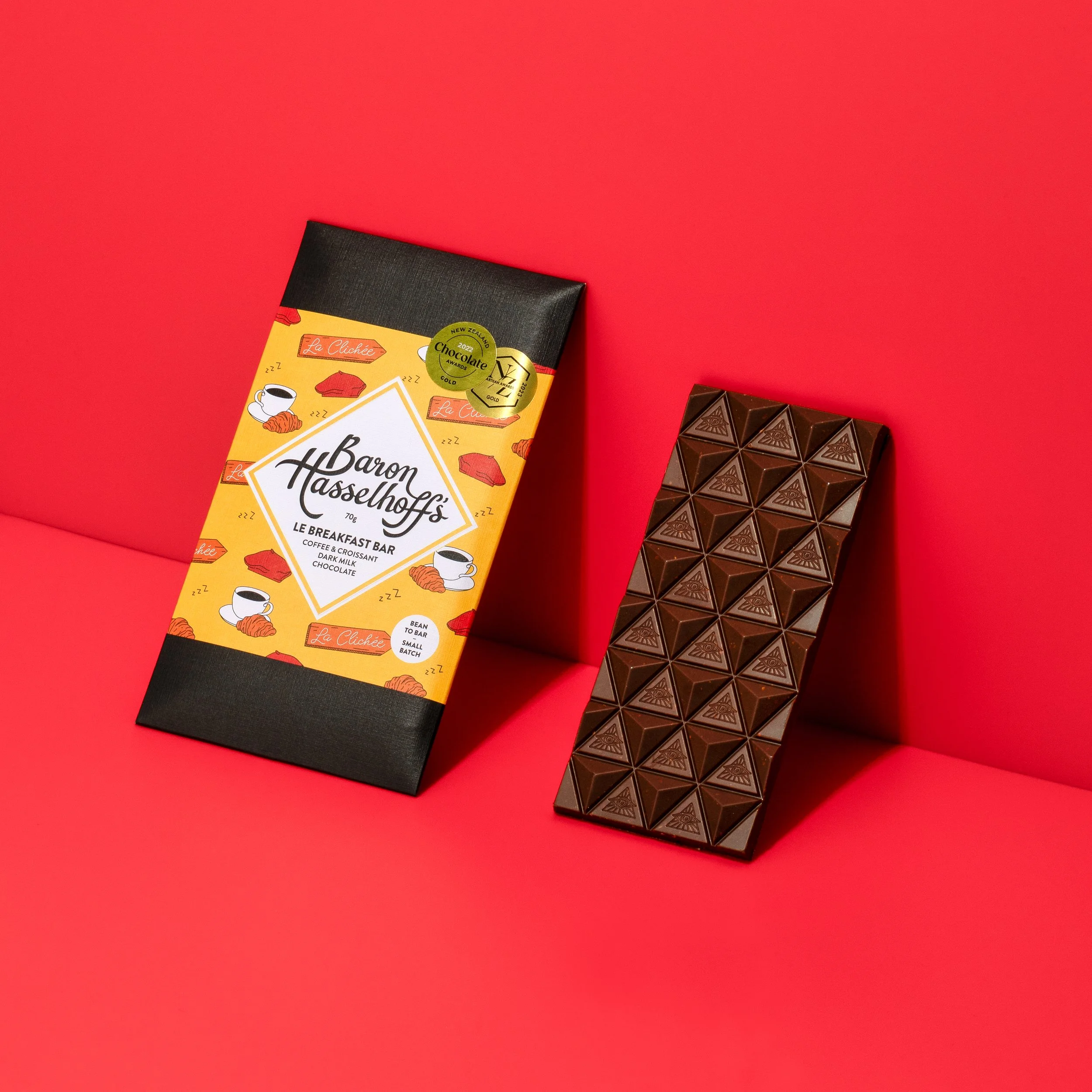 Baron Hasselhoff's Le Breakfast Bar on a red background. Studio photography, packaging design, branding, typography, designer. Alice Lloyd.