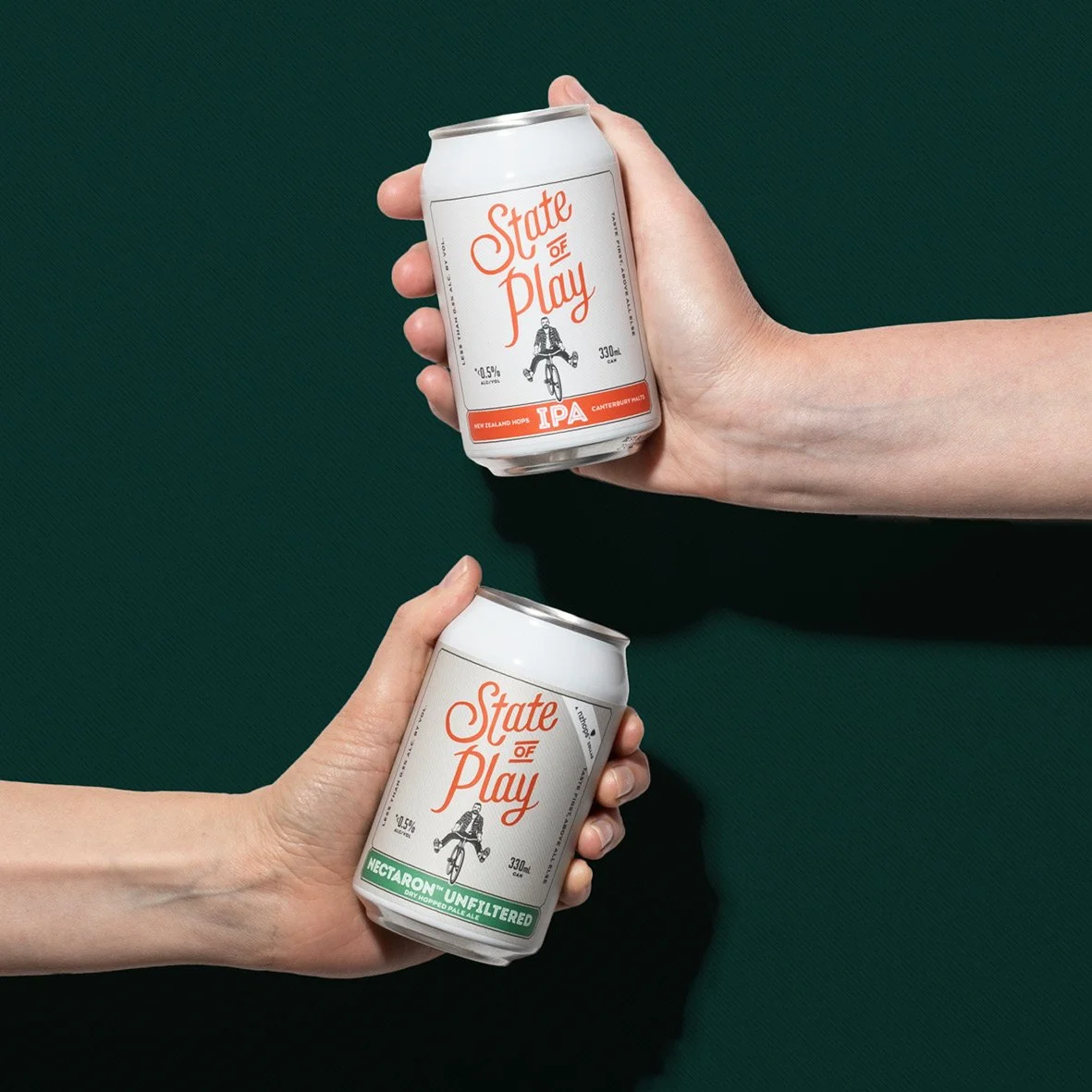 Two hands holding beer cans. Studio photography, packaging design, branding, designer. Alice Lloyd.
