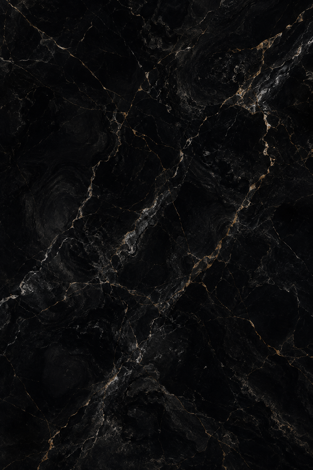 Close-up of black marble with gold and white veining.