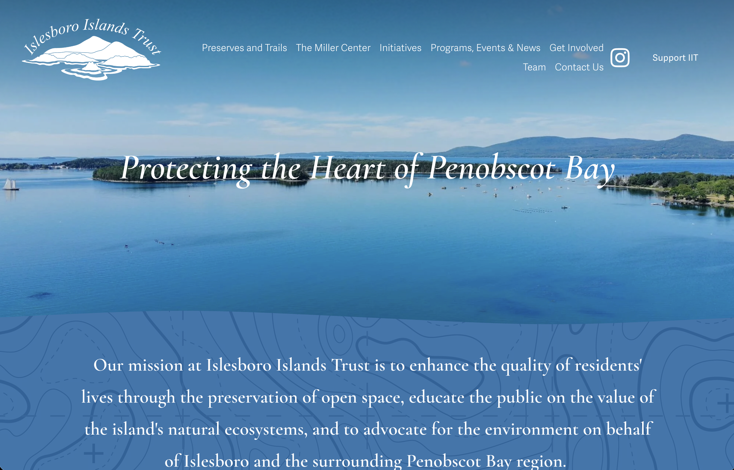 Website homepage for Islesboro Islands Trust land trust. A scenic view of Penobscot Bay with calm blue water, green islands, and distant hills under a partly cloudy sky, used as a background for the Isleboro Islands Trust website header.
