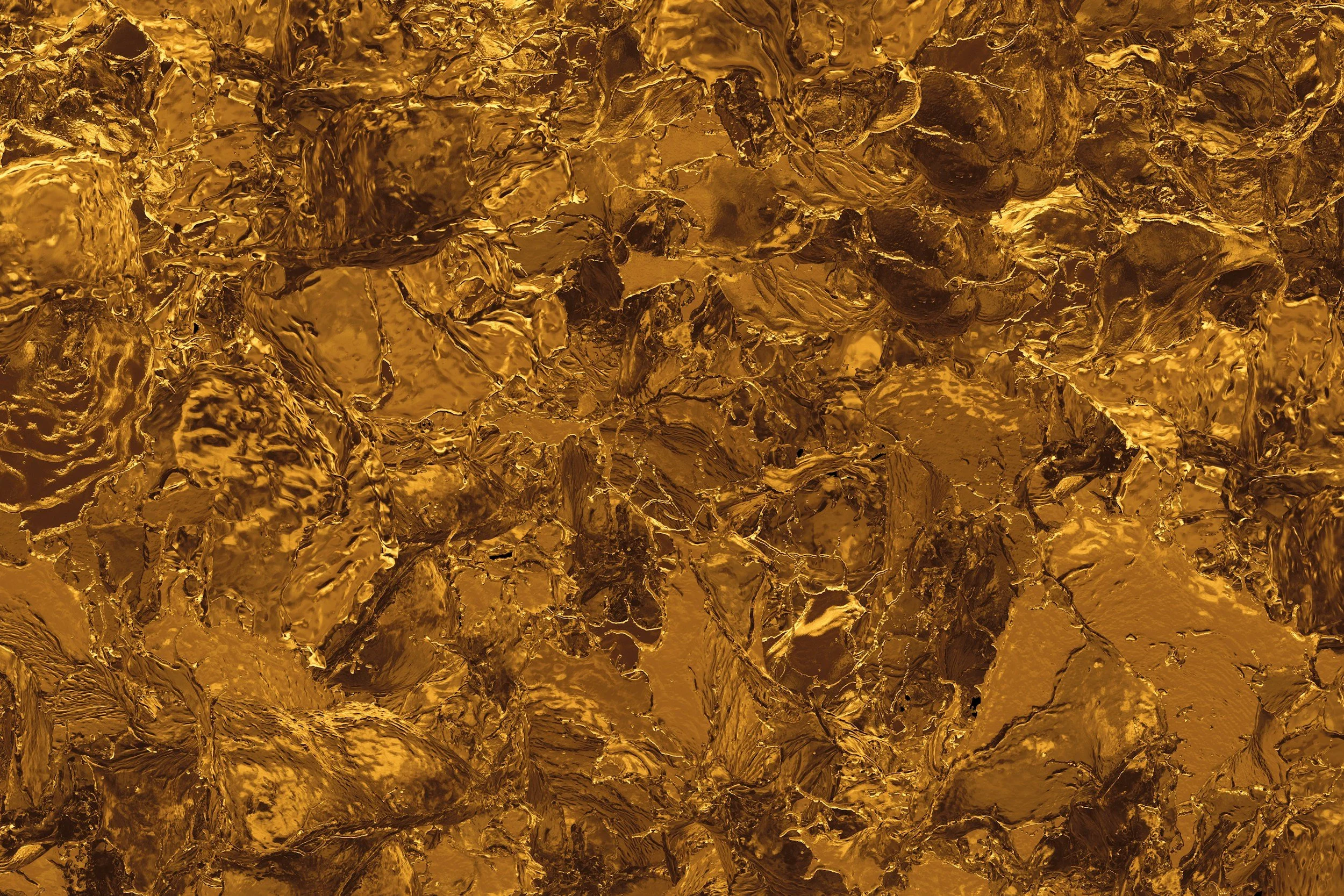 Close-up of crumpled gold foil with shiny, textured surface.