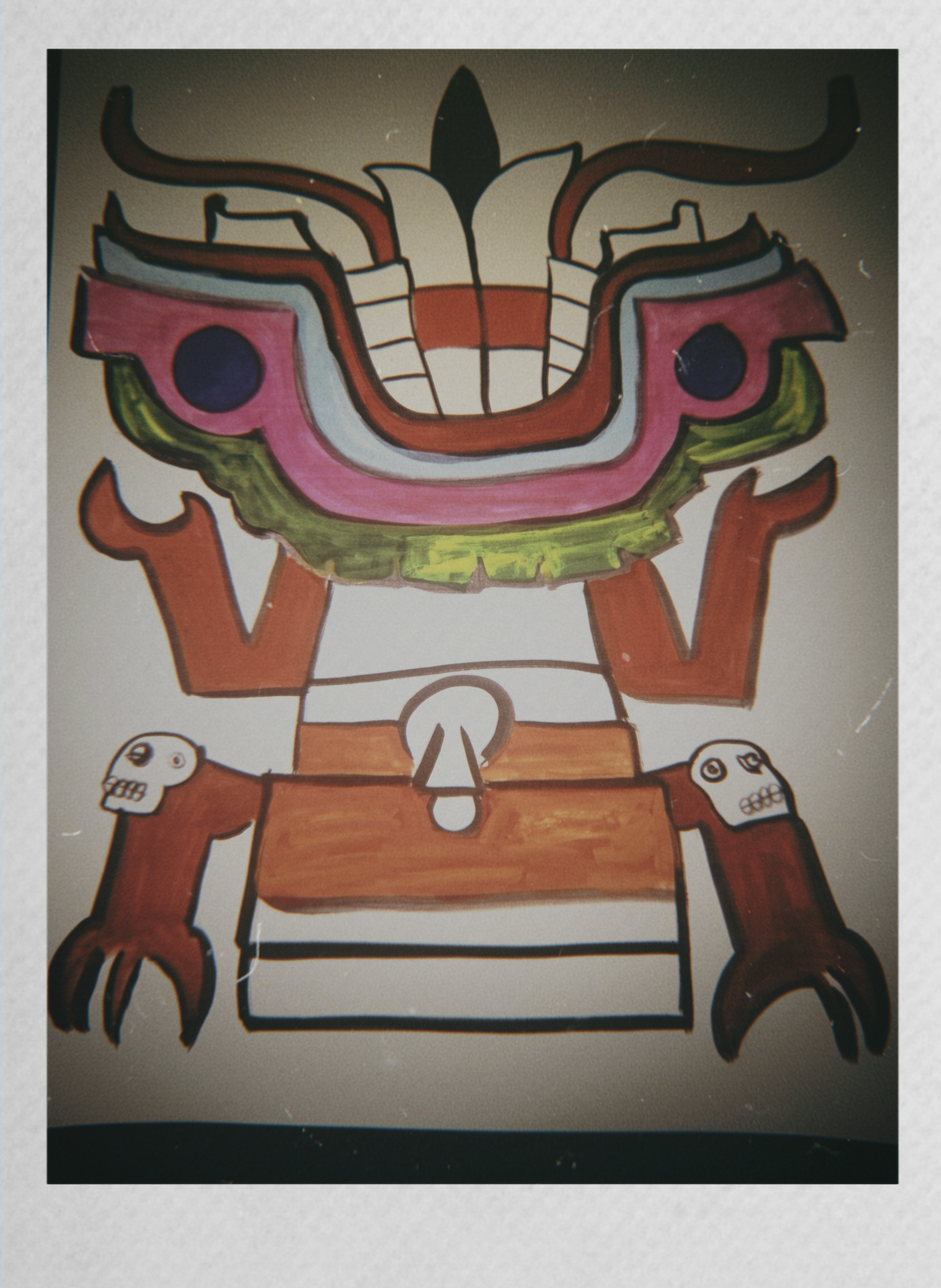 Colorful drawing of a character with a large smiling face, two large black eyes, orange limbs, and a green collar, holding skulls in each hand, with a small bird at the bottom.
