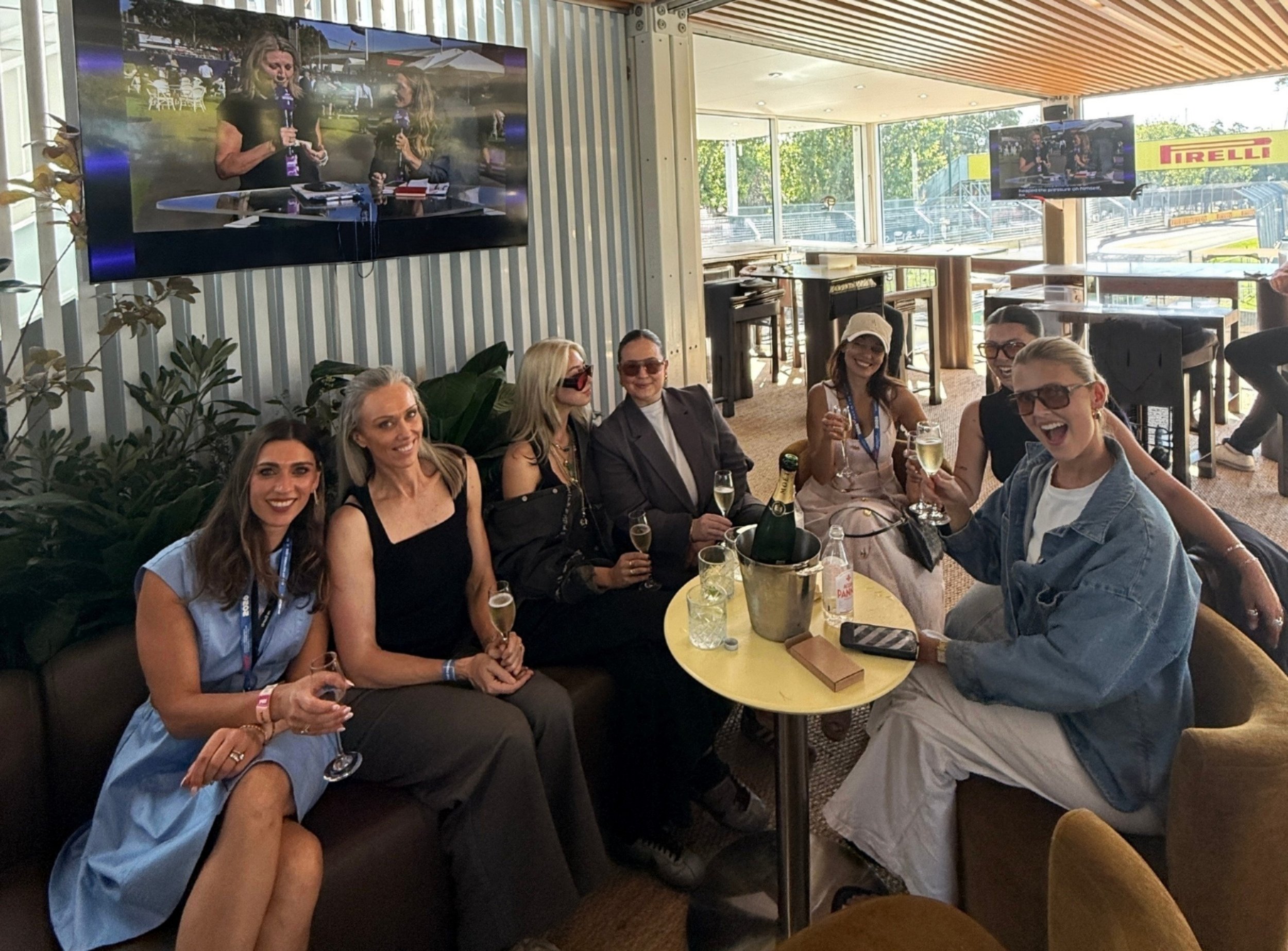 Women enjoying F1 hospitality at The Precinct at the Australian Grand Prix, Beyond the Circuit  Experiences group travel